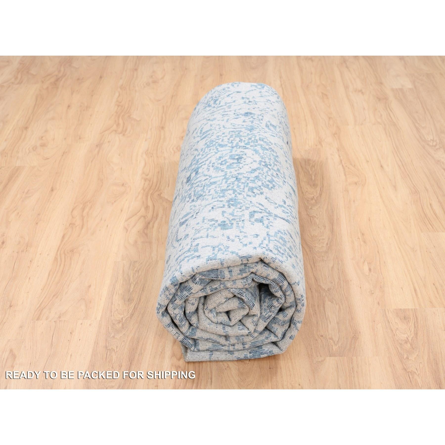 Tappeto rotondo grigio lavorato a mano in lana finemente jacquard e seta a base vegetale 12'0