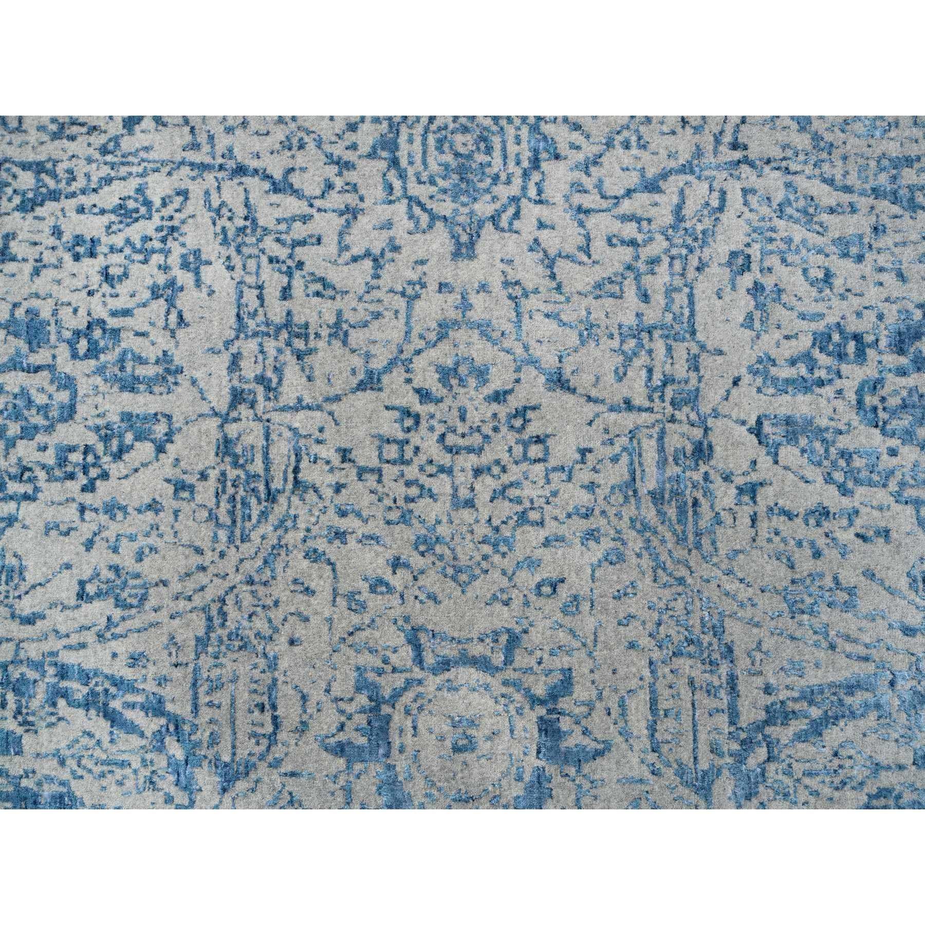 Tappeto rotondo grigio lavorato a mano in lana finemente jacquard e seta a base vegetale 12'0