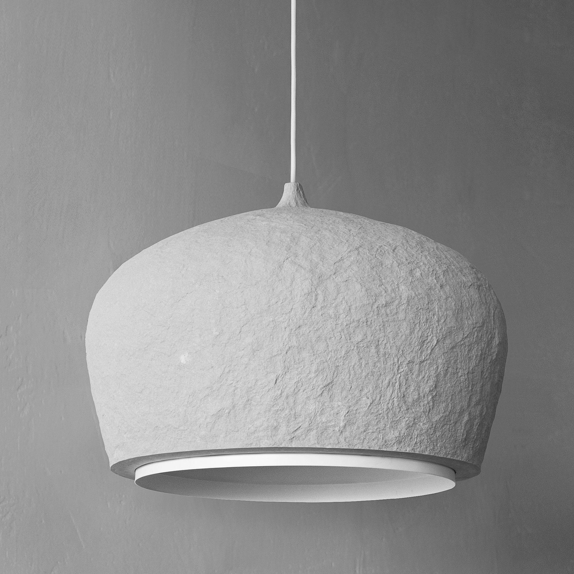 Pendant light “BALANCE”, gray, low.

A combination of natural stone-like rigidity and lightness of a cloud. These handmade ceiling lights have a unique character and bring a sense of harmony. The ceiling lights are a versatile fit for spaces of