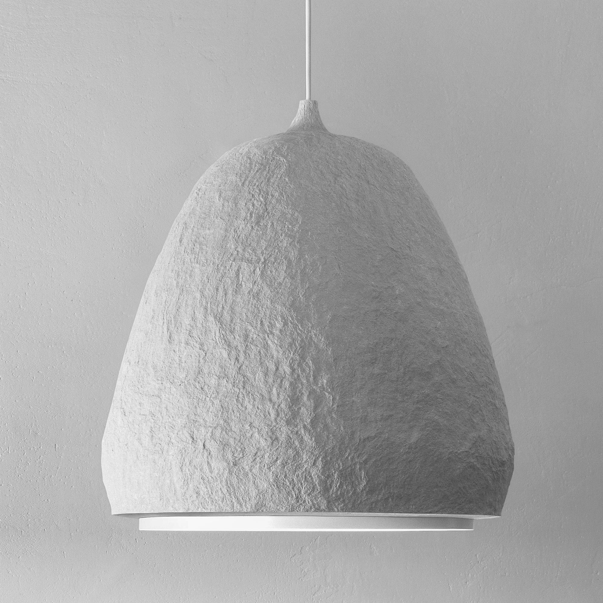Pendant light “BALANCE”, gray, tall.

A combination of natural stone-like rigidity and lightness of a cloud. These handmade ceiling lights have a unique character and bring a sense of harmony. The ceiling lights are a versatile fit for spaces of