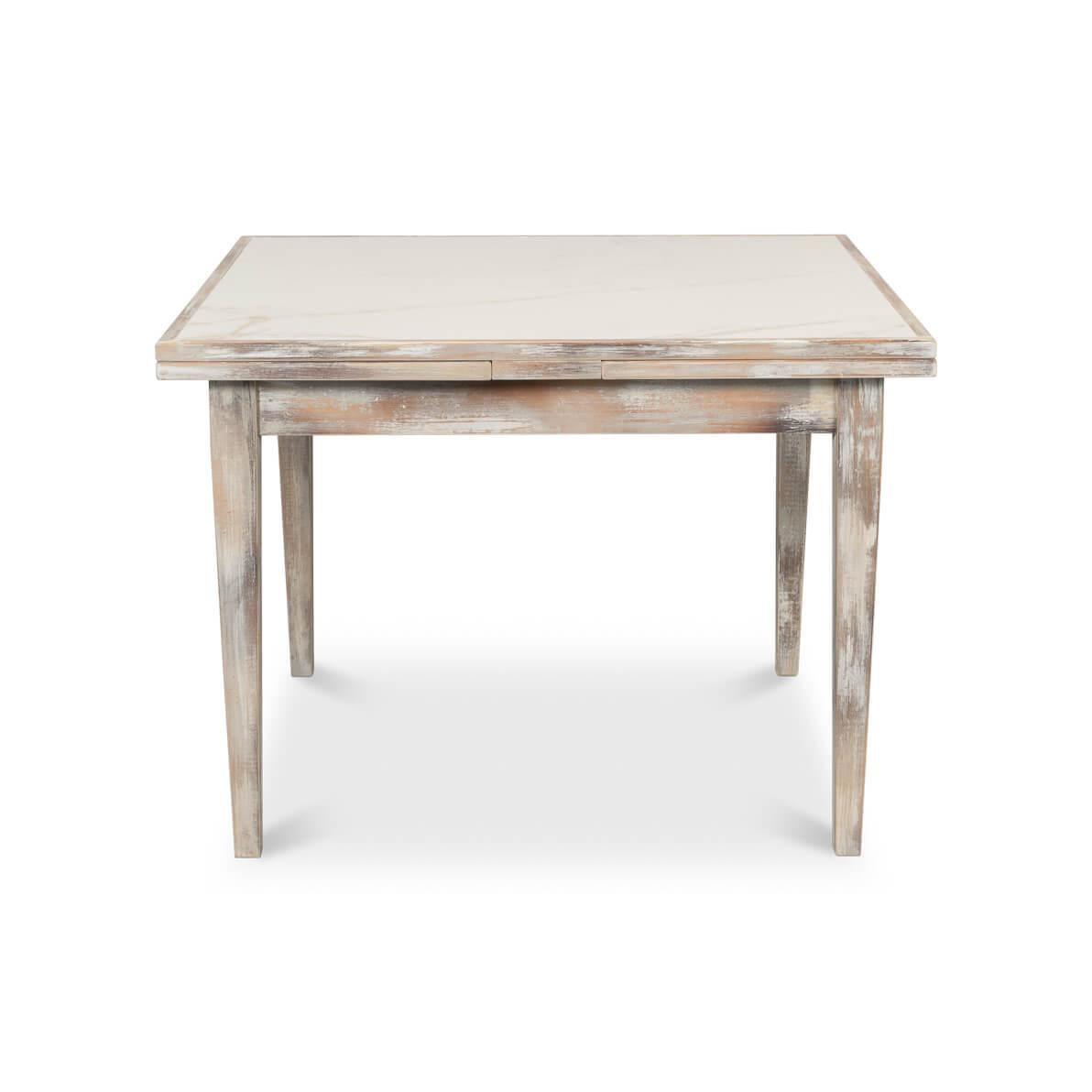 An Italian-style draw leaf table converts from a square 41
