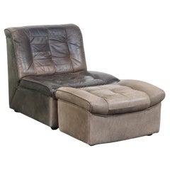 Elemento de diseño/sillón de cuero gris de los años 70 + reposapiés