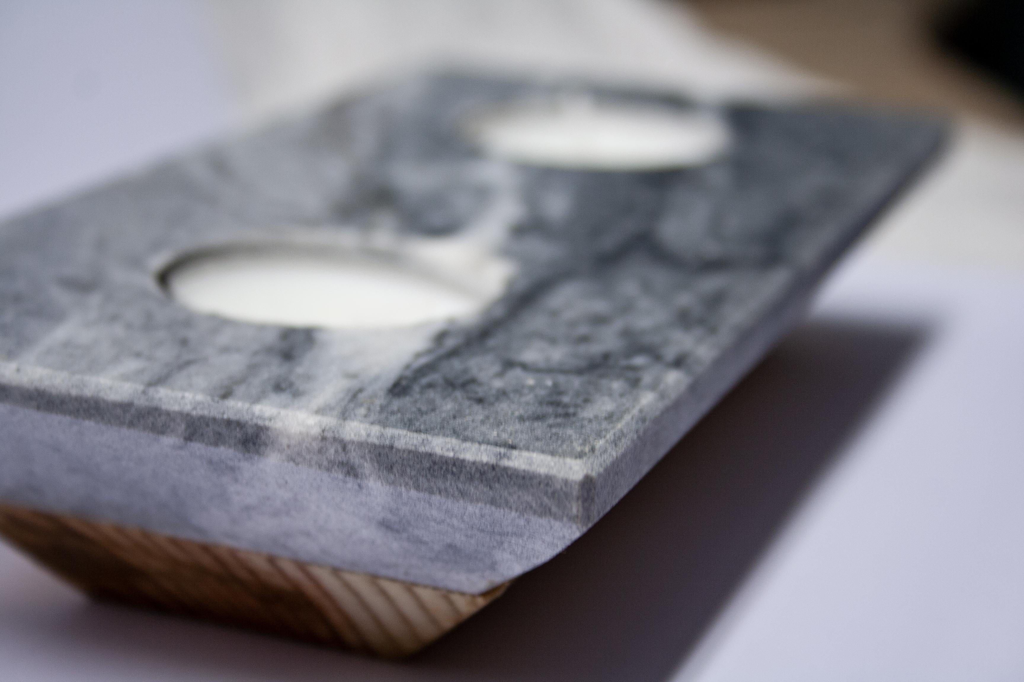 Gray Marble Candle Holder for Two Candles Special Gift Design Mother’s Day Gift.
This small marble decorative object has a unique inverted pyramid shape and holds two candles making it a perfect elegant and sophisticated gift.
Its upper structure is