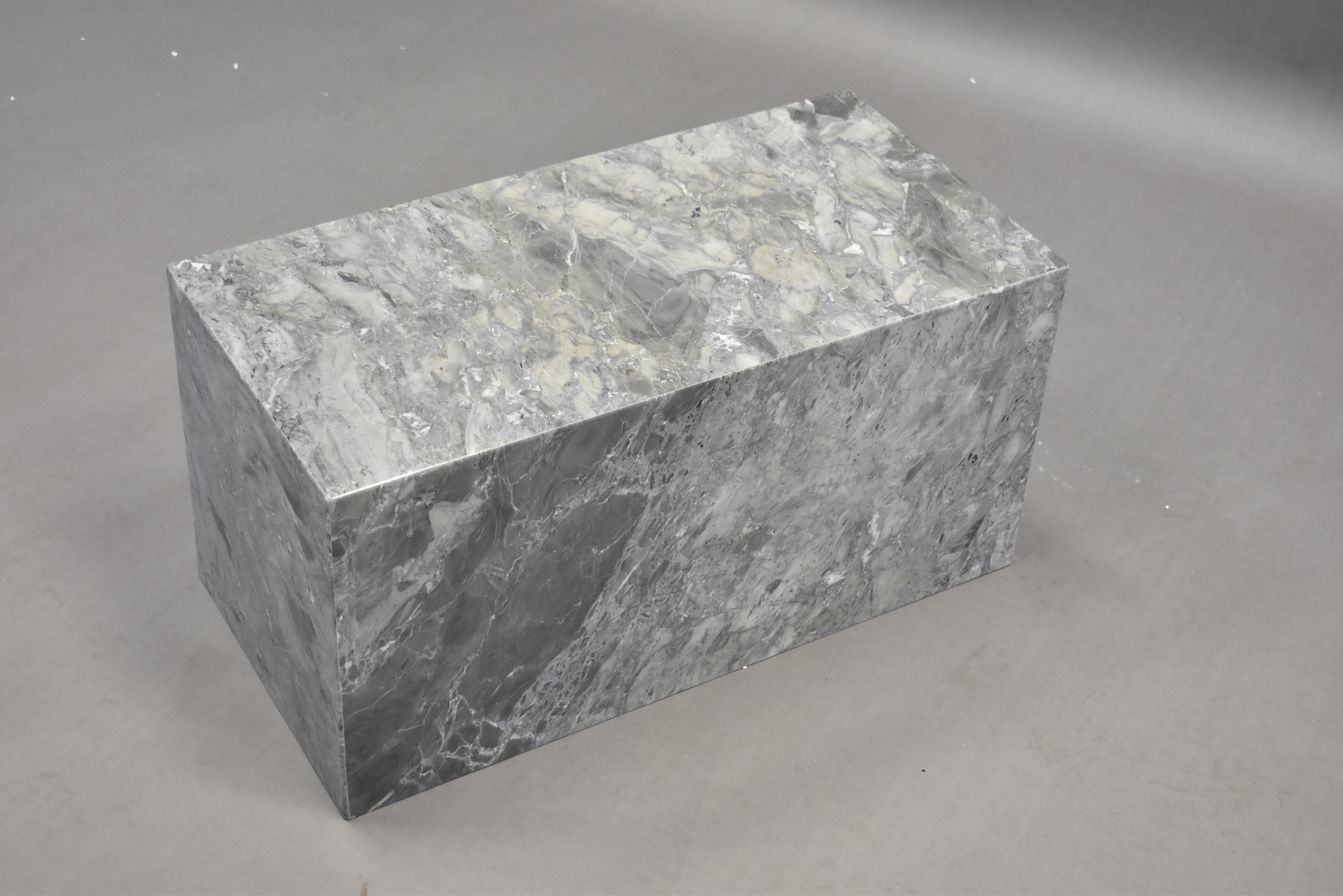 Brand new and sleek side table made from polished Cleopatra Grey marble. In tones of grey, gunmetal and white. Displays striking veining and movement to capture the beauty of the stone material.