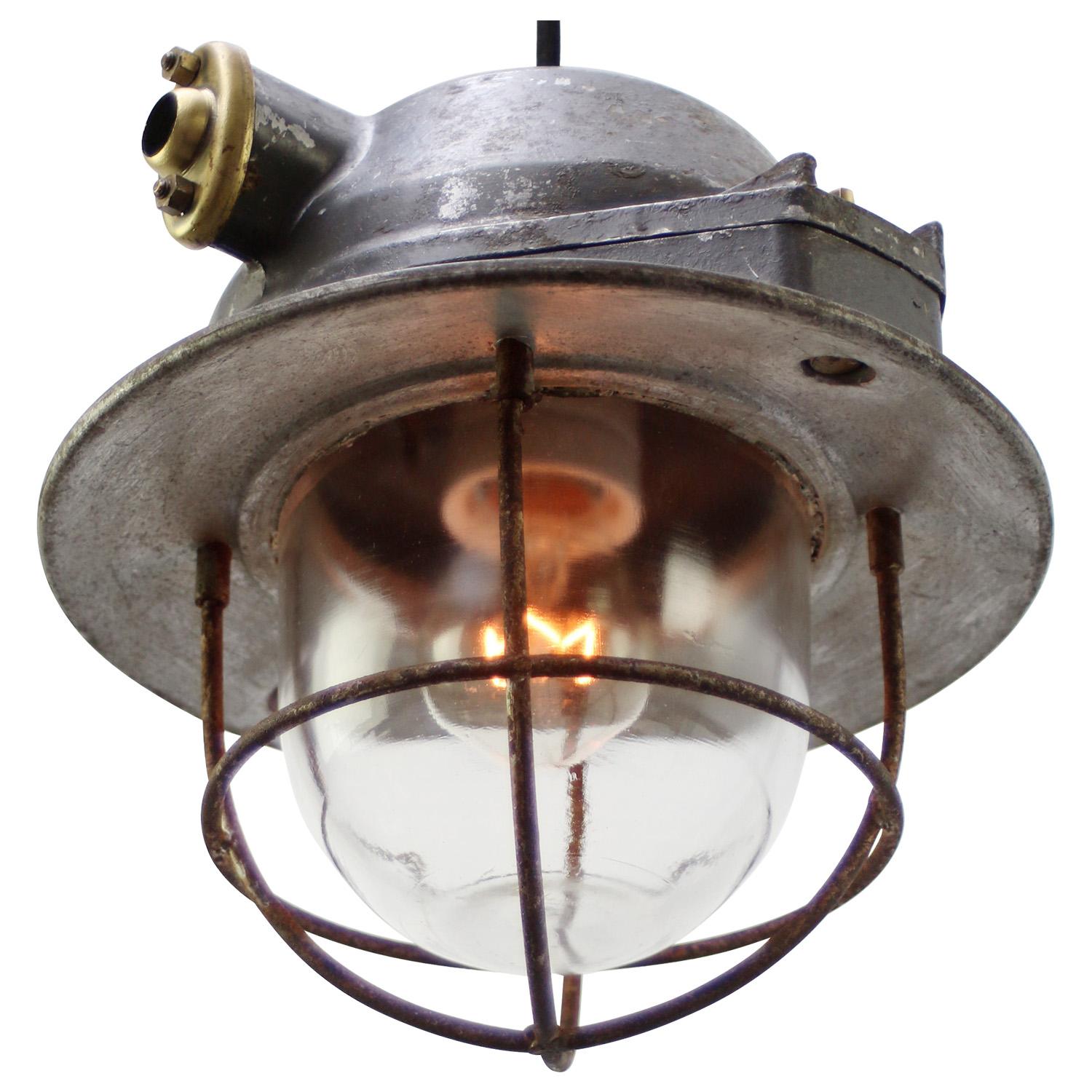 Industrial hanging lamp by EMD, France.
Cast aluminium, brass and frosted glass

Weight 3.65 kg / 8 lb

Priced per individual item. All lamps have been made suitable by international standards for incandescent light bulbs, energy-efficient and LED