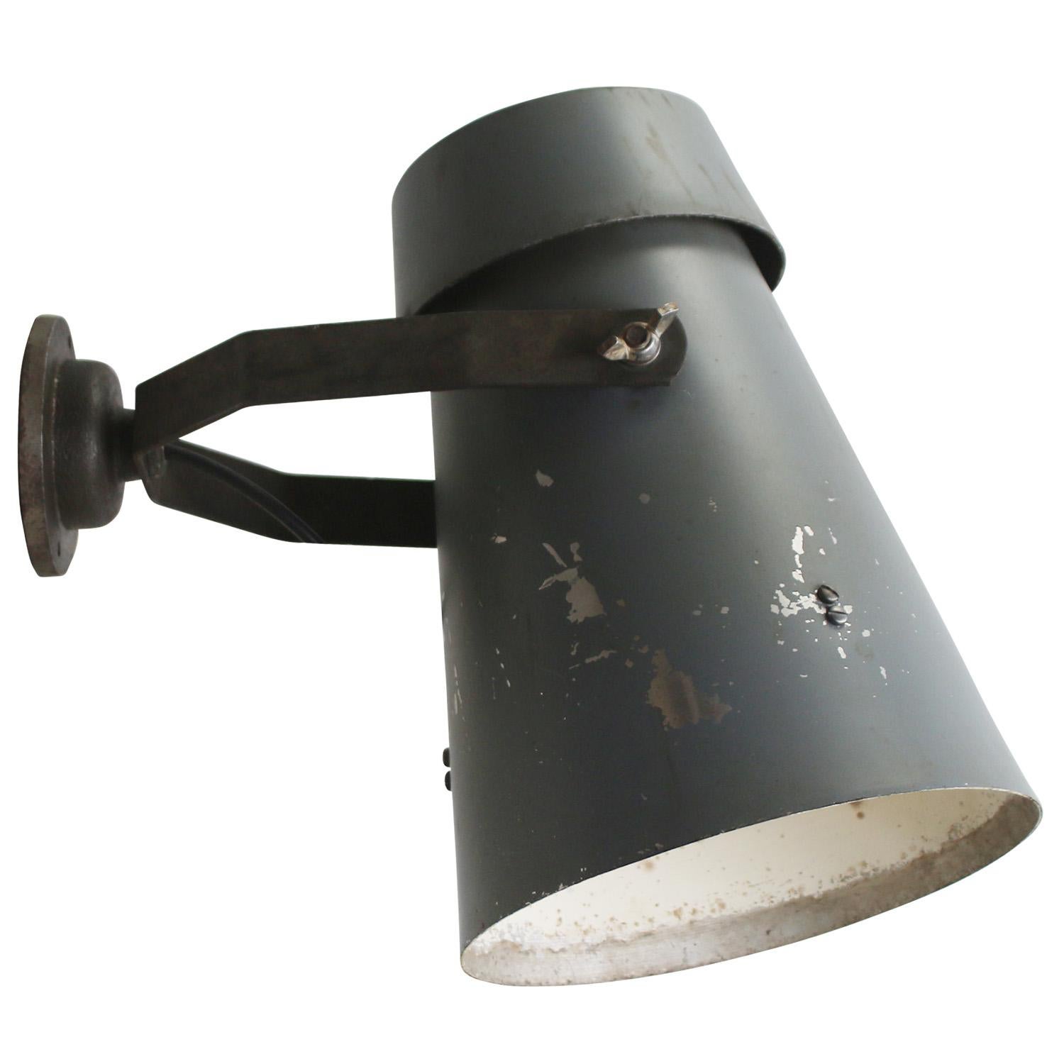 Dutch industrial wall lamp by Philips, Holland
Grey aluminium, white inside
Cast iron arm

Diameter cast iron wall piece: 10.5 cm / 4”,
2 holes to secure

Weight: 2.40 kg / 5.3 lb

Priced per individual item. All lamps have been made suitable by