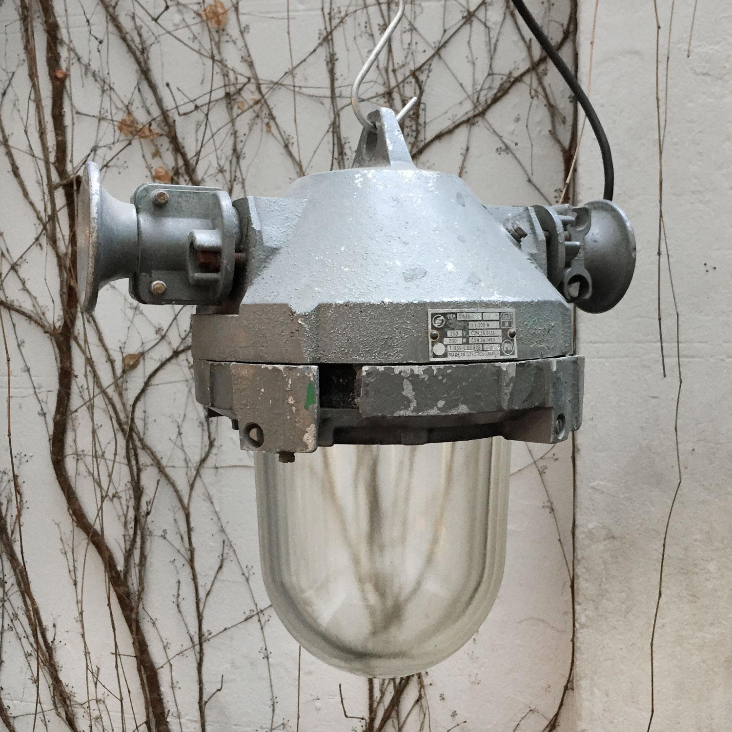 Cast Gray Metal Vintage Industrial Clear Glass Pendant Light For Sale