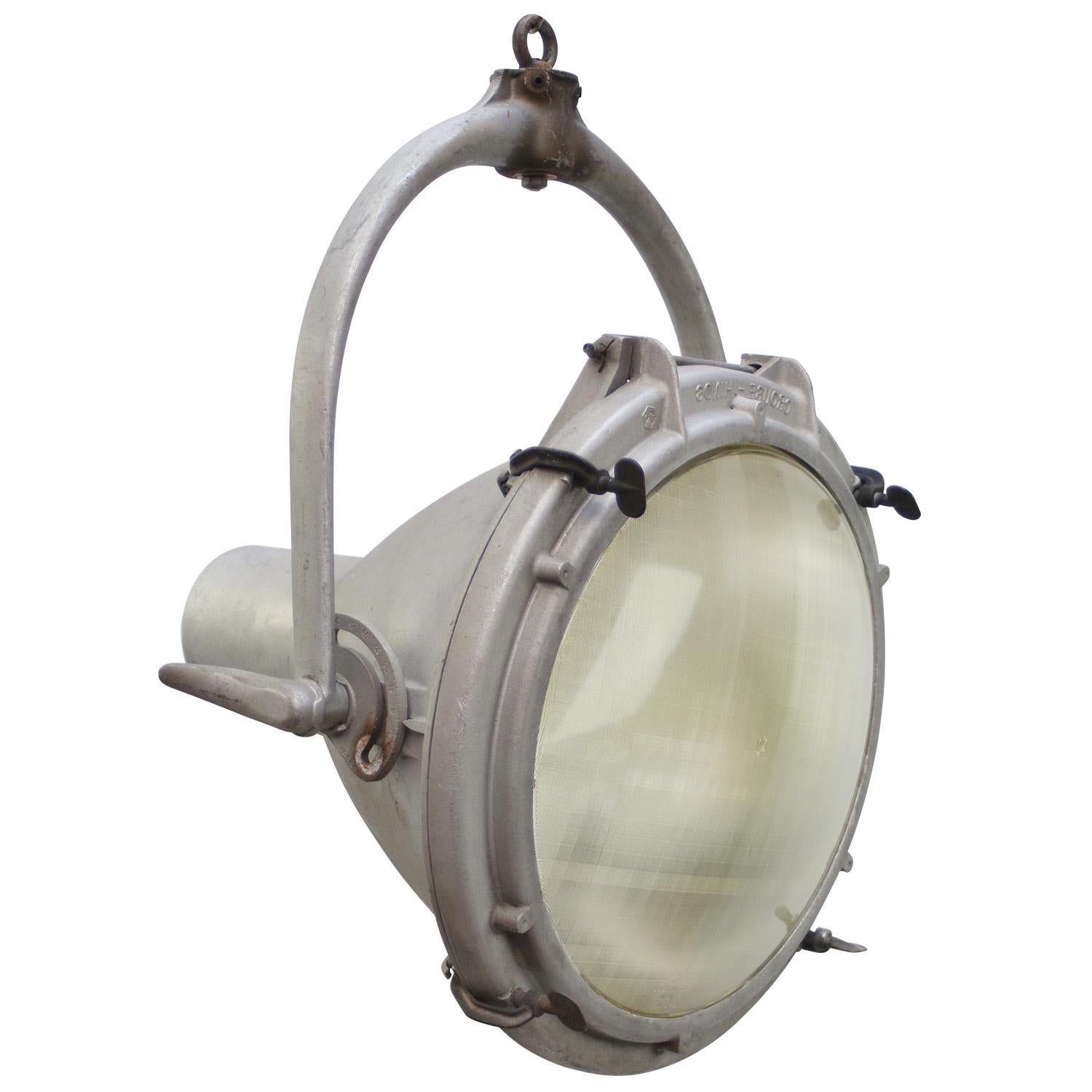 Industrial hanging light Crouse-Hinds Spot USA.
Cast aluminium with frosted glass. 

Weight: 16.50 kg / 36.4 lb

Priced per individual item. All lamps have been made suitable by international standards for incandescent light bulbs, energy-efficient