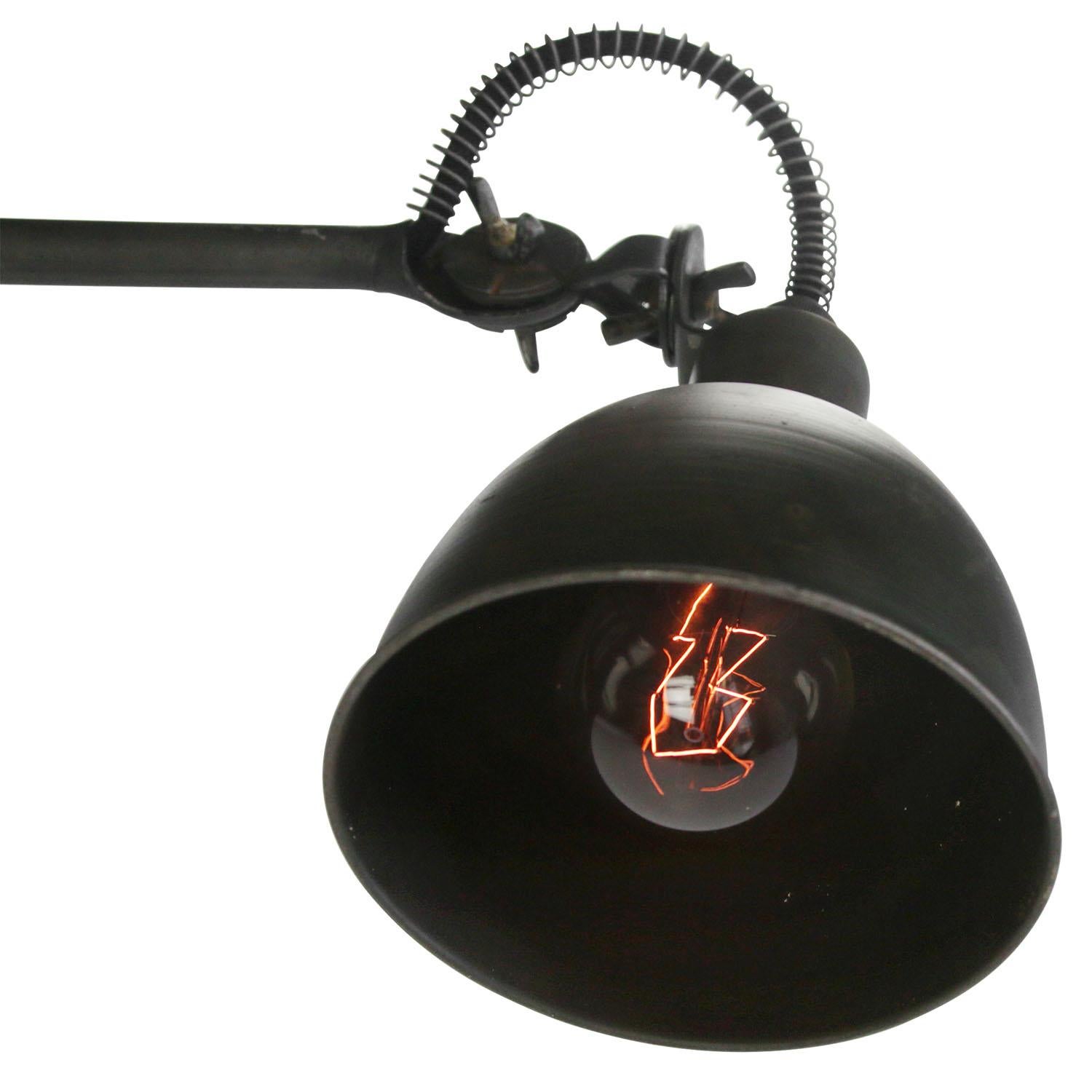 Metal work light / wall lamp with 2 arms.
Metal shade

Diameter foot 10 cm

E27/E26

Priced per individual item. All lamps have been made suitable by international standards for incandescent light bulbs, energy-efficient and LED bulbs.