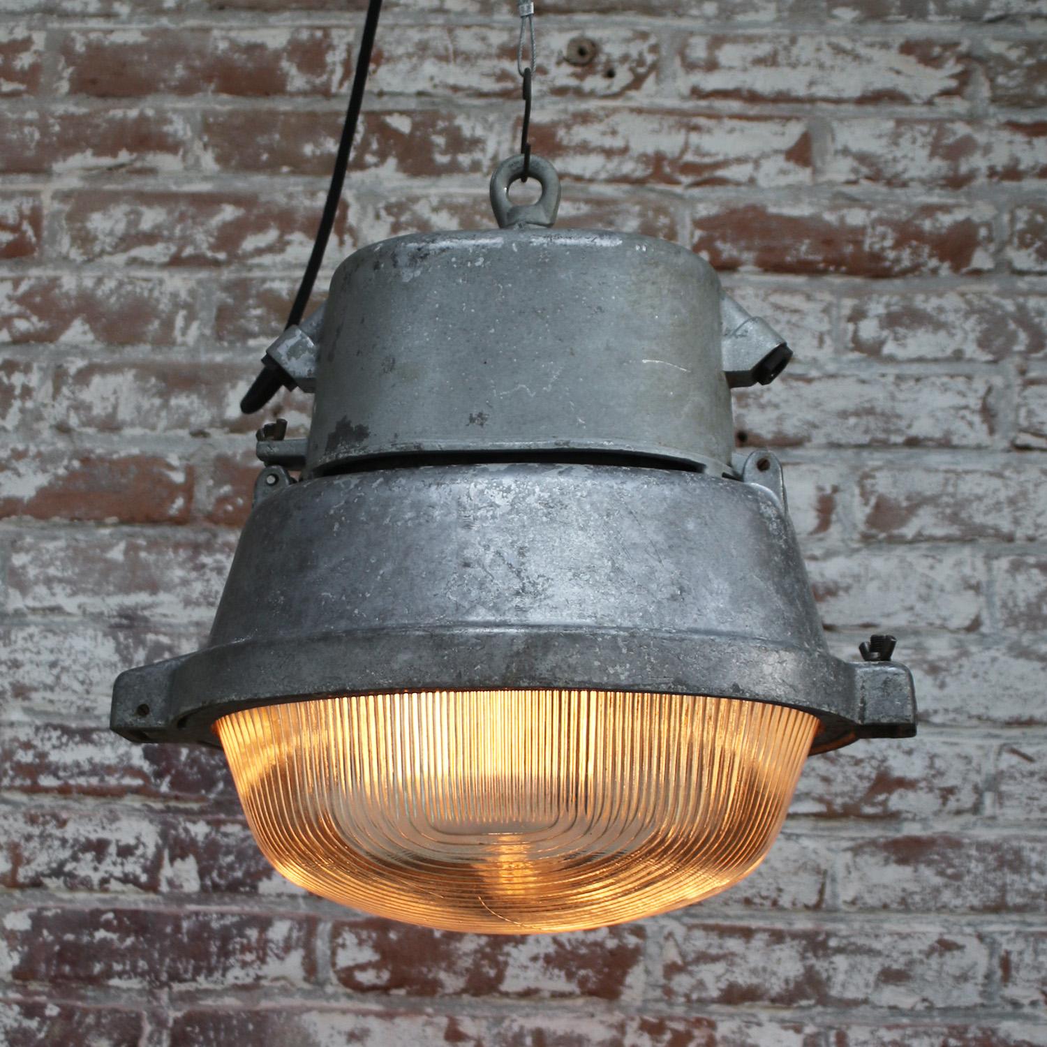 Gray metal Vintage Industrial Oval Holophane Glass Street Light In Good Condition For Sale In Amsterdam, NL