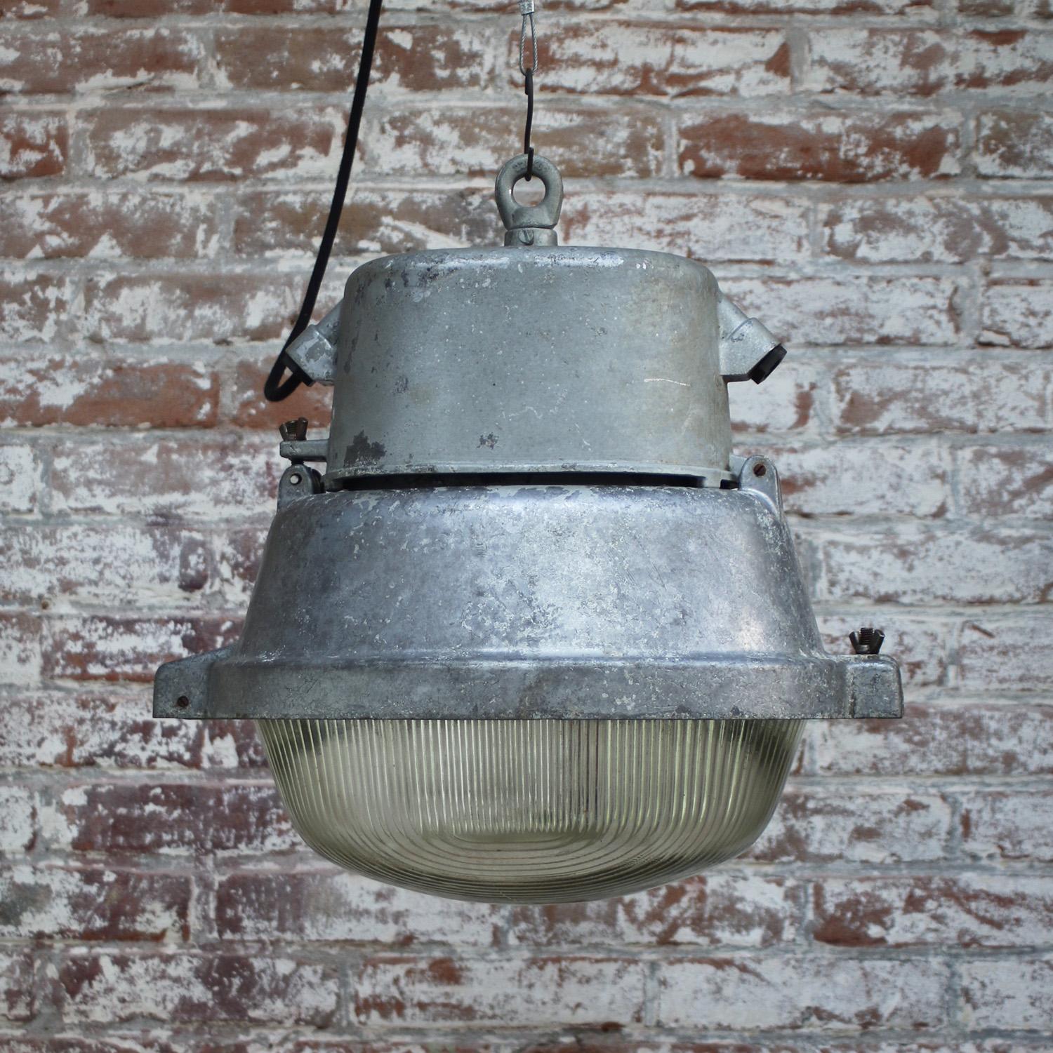 20th Century Gray metal Vintage Industrial Oval Holophane Glass Street Light For Sale