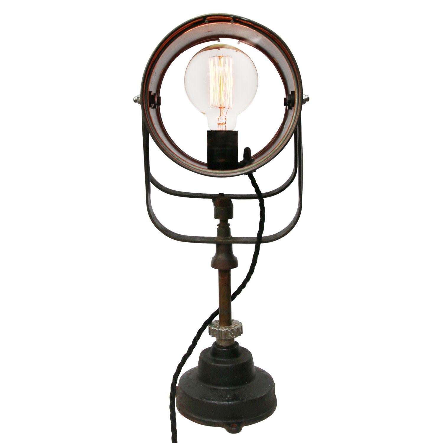 Ship light, glass on 2 sides.
gray metal desk light
adjustable in angle
cast iron base
2 meter black cotton flex.
plug and Bakelite switch

Weight: 4.00 kg / 8.8 lb

Priced per individual item. All lamps have been made suitable by