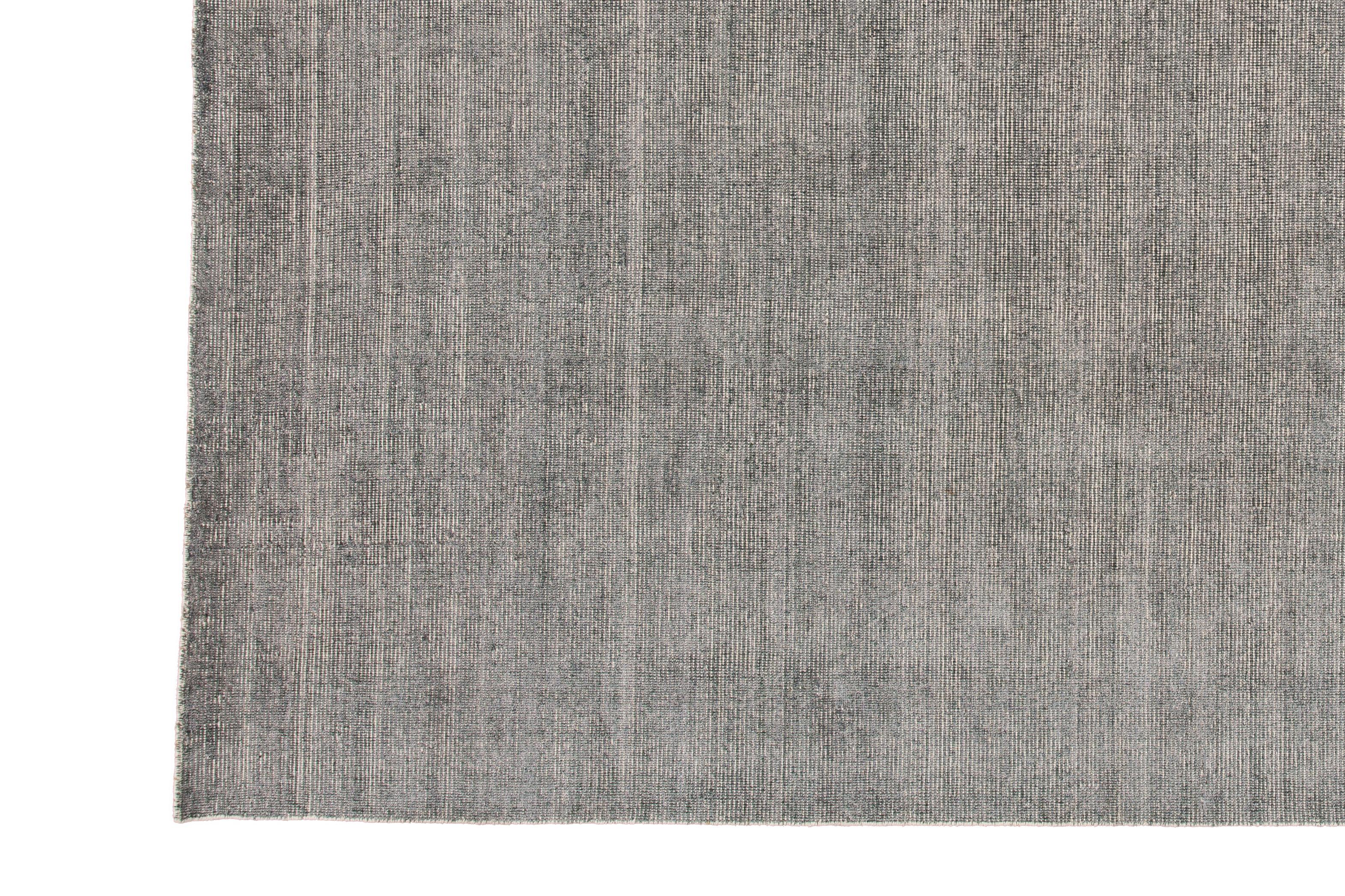 Beautiful modern Handmade Indian bamboo and silk boho rug with a gray field. This boho collection rug has an all-over solid design.

This rug measures: 10'0