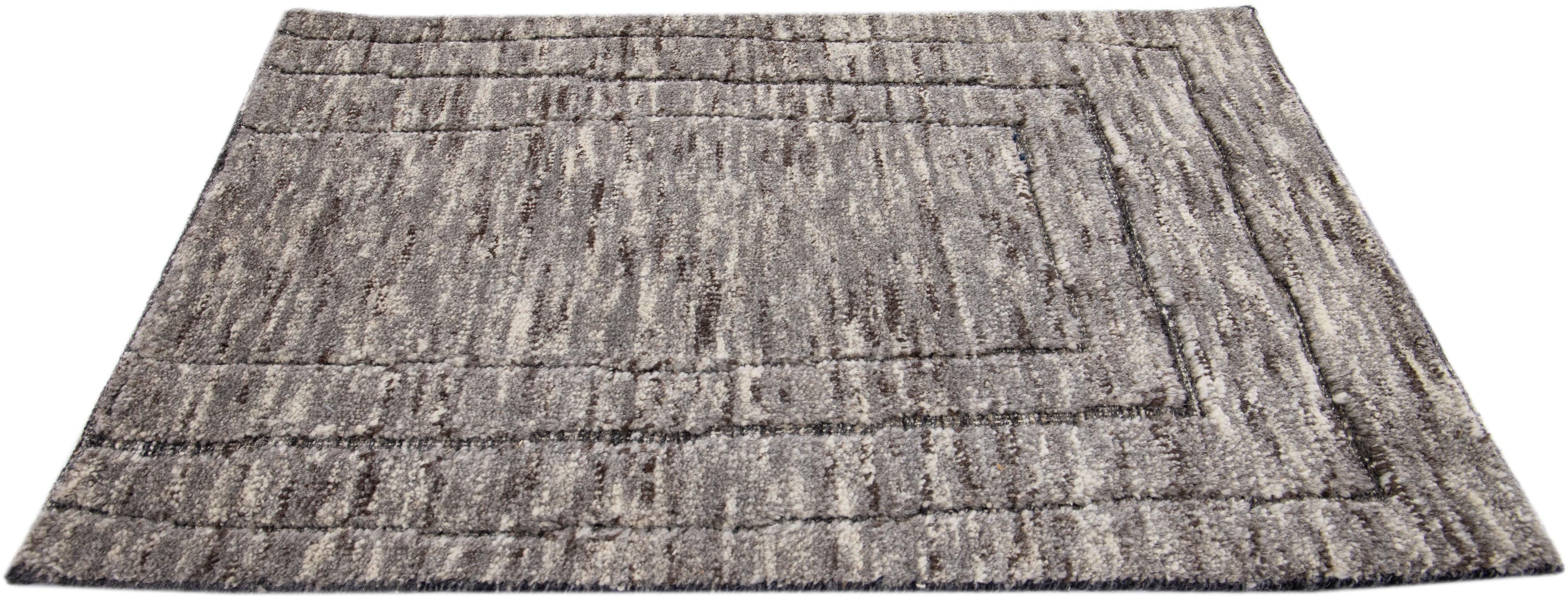 Apadana's Modern Moroccan Style wool custom rug. Custom sizes and colors made-to-order.

Material: 80 Wool and 20 Cotton.
Techniques: Hand-Loomed.
Style: Moroccan.
Lead time: Approx. 15-16 weeks available.
Colors: As shown, other custom colors are