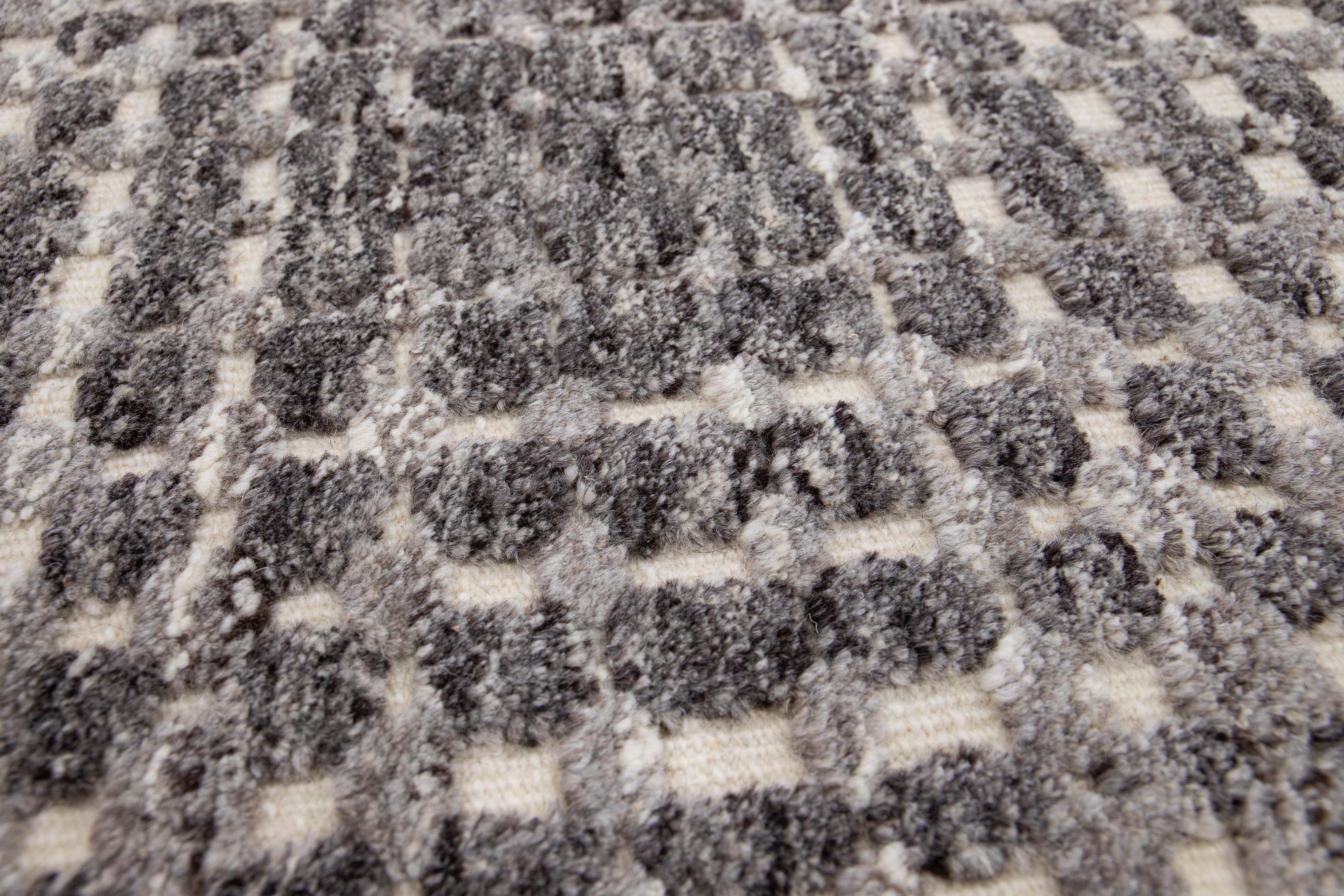 Apadana's Modern Moroccan Style wool custom rug. Custom sizes and colors made-to-order.

Material: 80 Wool and 20 Cotton.
Techniques: Hand-Loomed.
Style: Moroccan.
Lead time: Approx. 15-16 weeks available.
Colors: As shown, other custom colors are