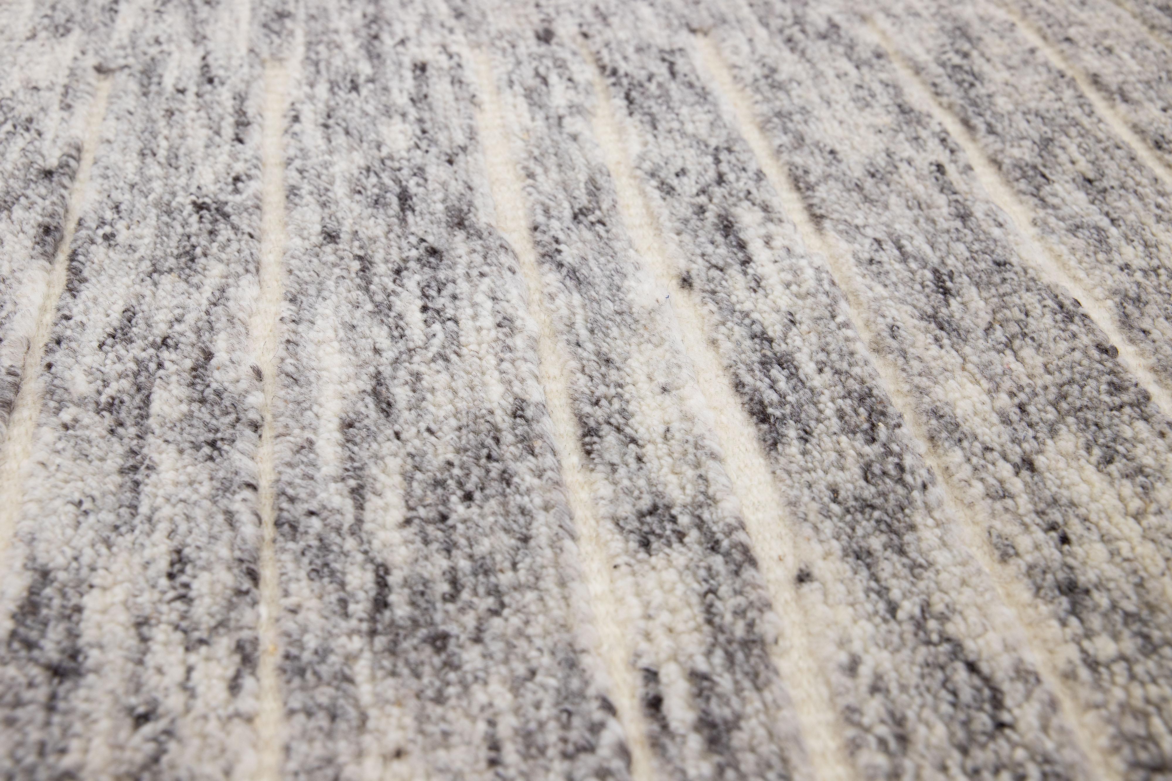 Apadana's Modern Moroccan Style wool custom rug. Custom sizes and colors made-to-order.

Material: 90 Wool and 10 Cotton.
Techniques: Hand-Loomed.
Style: Moroccan.
Lead time: Approx. 15-16 weeks available.
Colors: As shown, other custom colors are