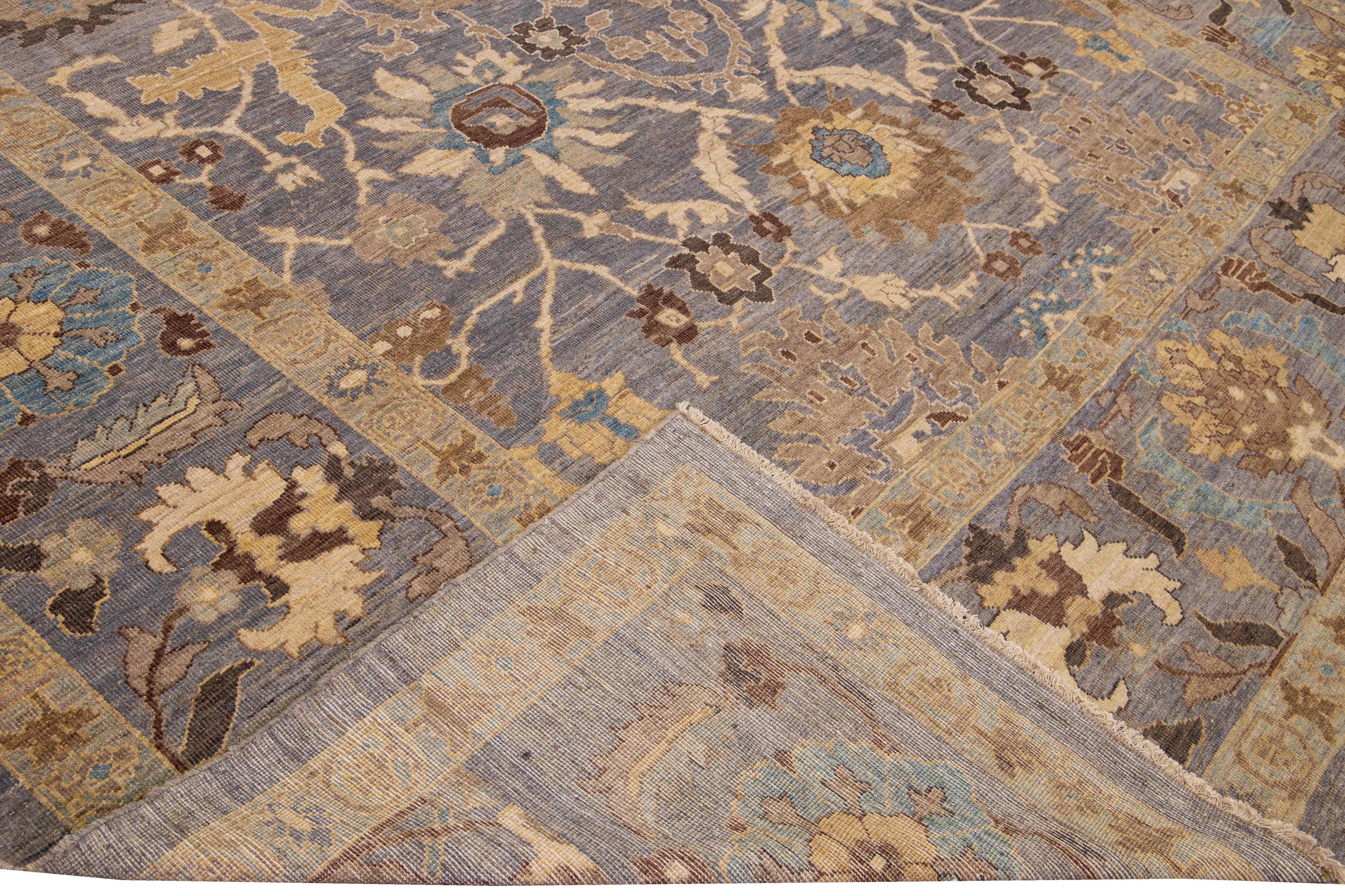 Beautiful modern Sultanabad hand-knotted wool rug with a gray field. This Sultanabad rug has a beige, blue, brown, and goldenrod accent in a gorgeous all-over Classic floral pattern design.

This rug measures: 12' x 18'4