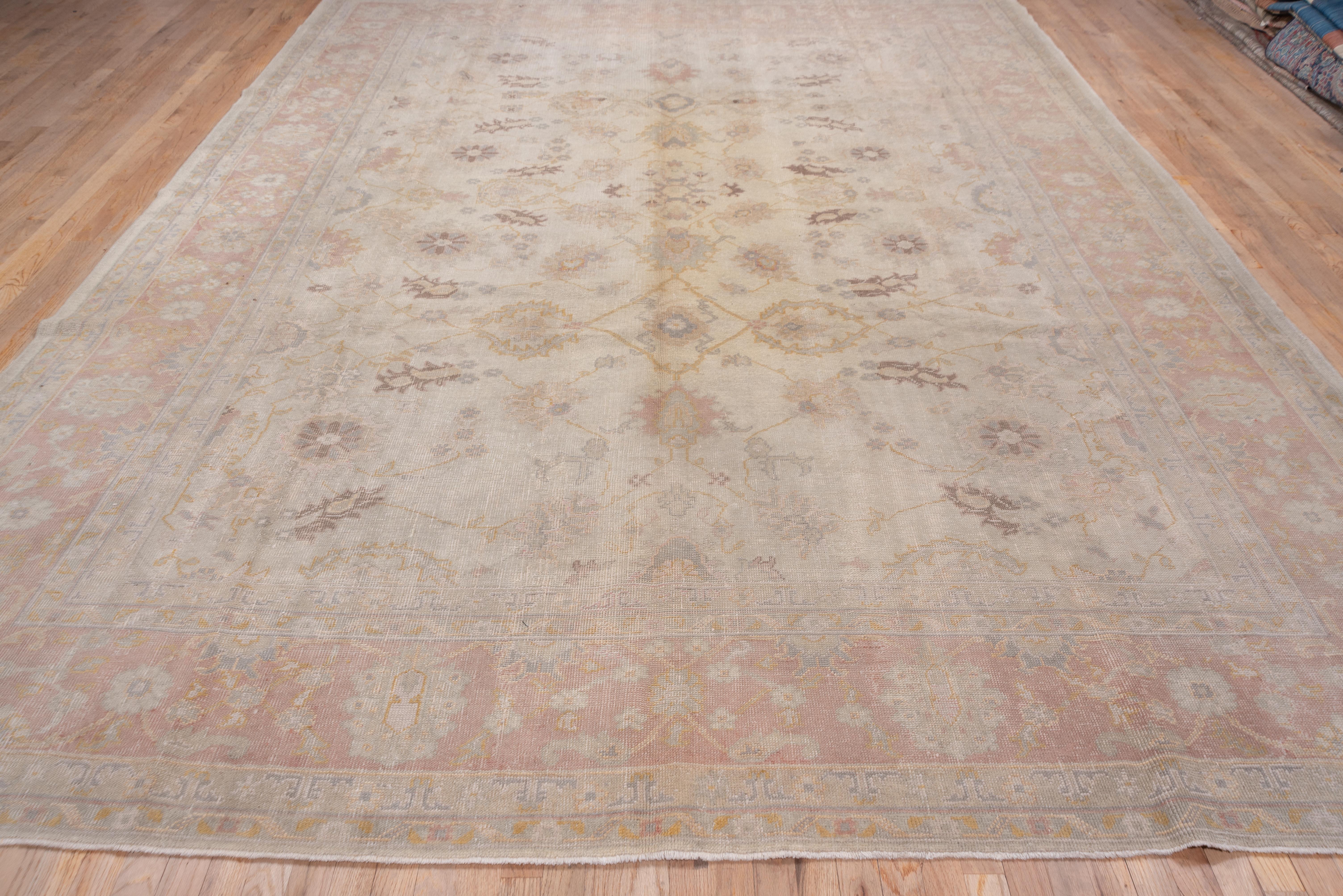 Early 20th Century Gray Oushak Carpet, Gray Field, Pink Borders, All-Over Field, Soft Tones For Sale