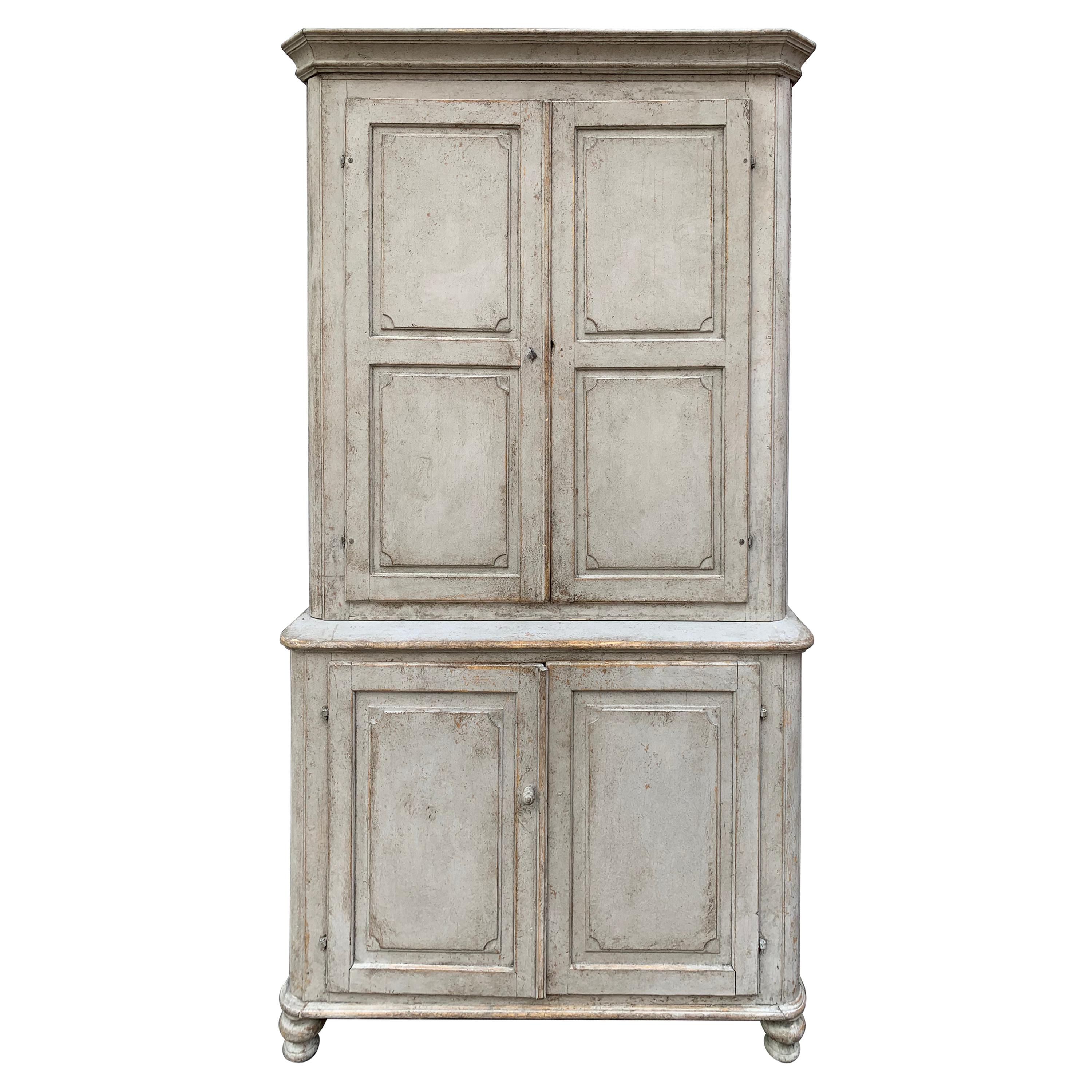 Gray painted Gustavian two-piece kitchen cupboard or cabinet, Sweden

Complimentary delivery to most areas of London UK, The Netherlands, Belgium, Denmark, Sweden and Northern Germany.
 