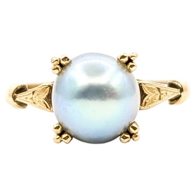 Solitaire-Ring mit grauer Perle aus 18-karätigem Gelbgold