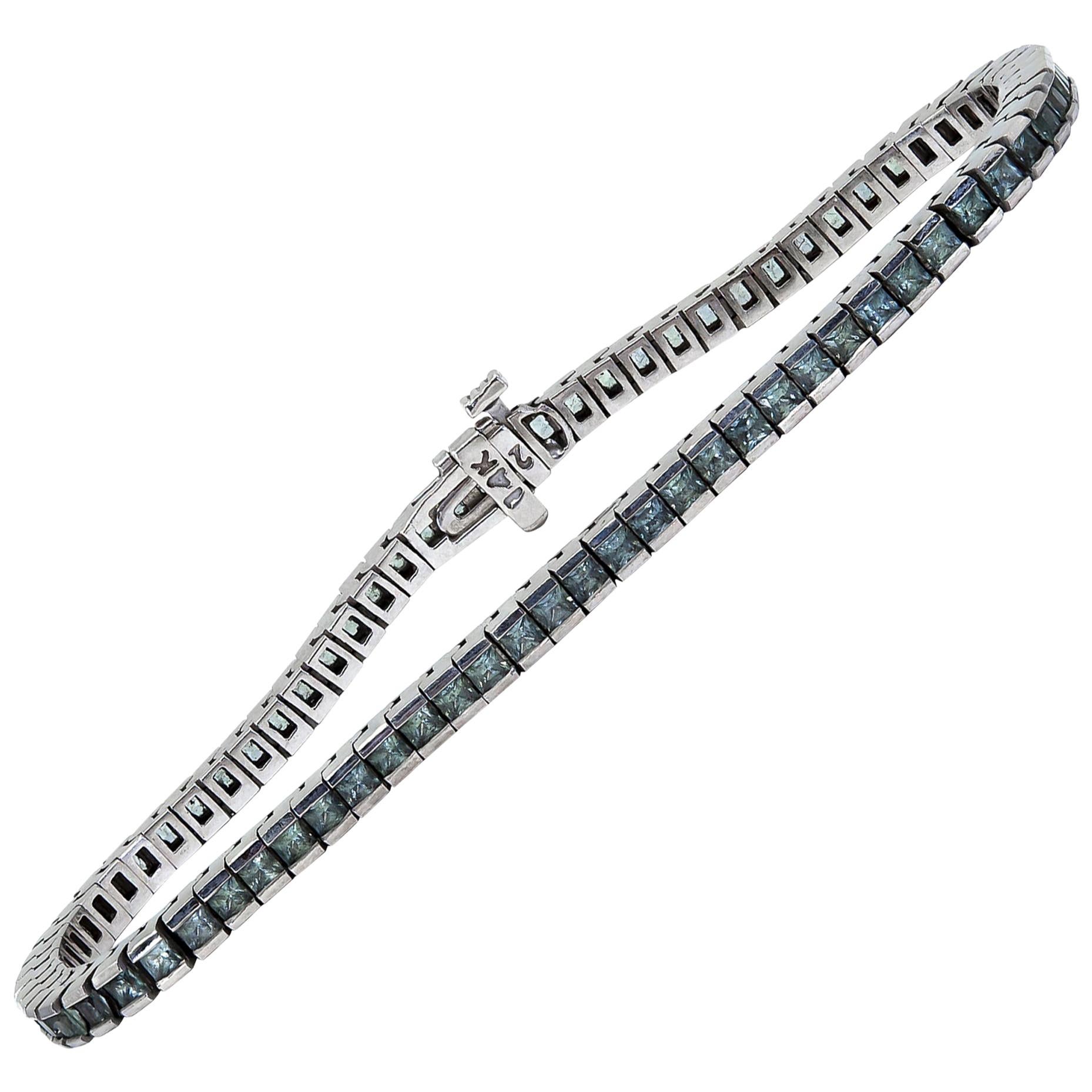 Gray Princess Cut Sapphire Tennis Bracelet set in 14 Karat White Gold For Sale