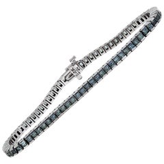 Gray Princess Cut Sapphire Tennis Bracelet set in 14 Karat White Gold