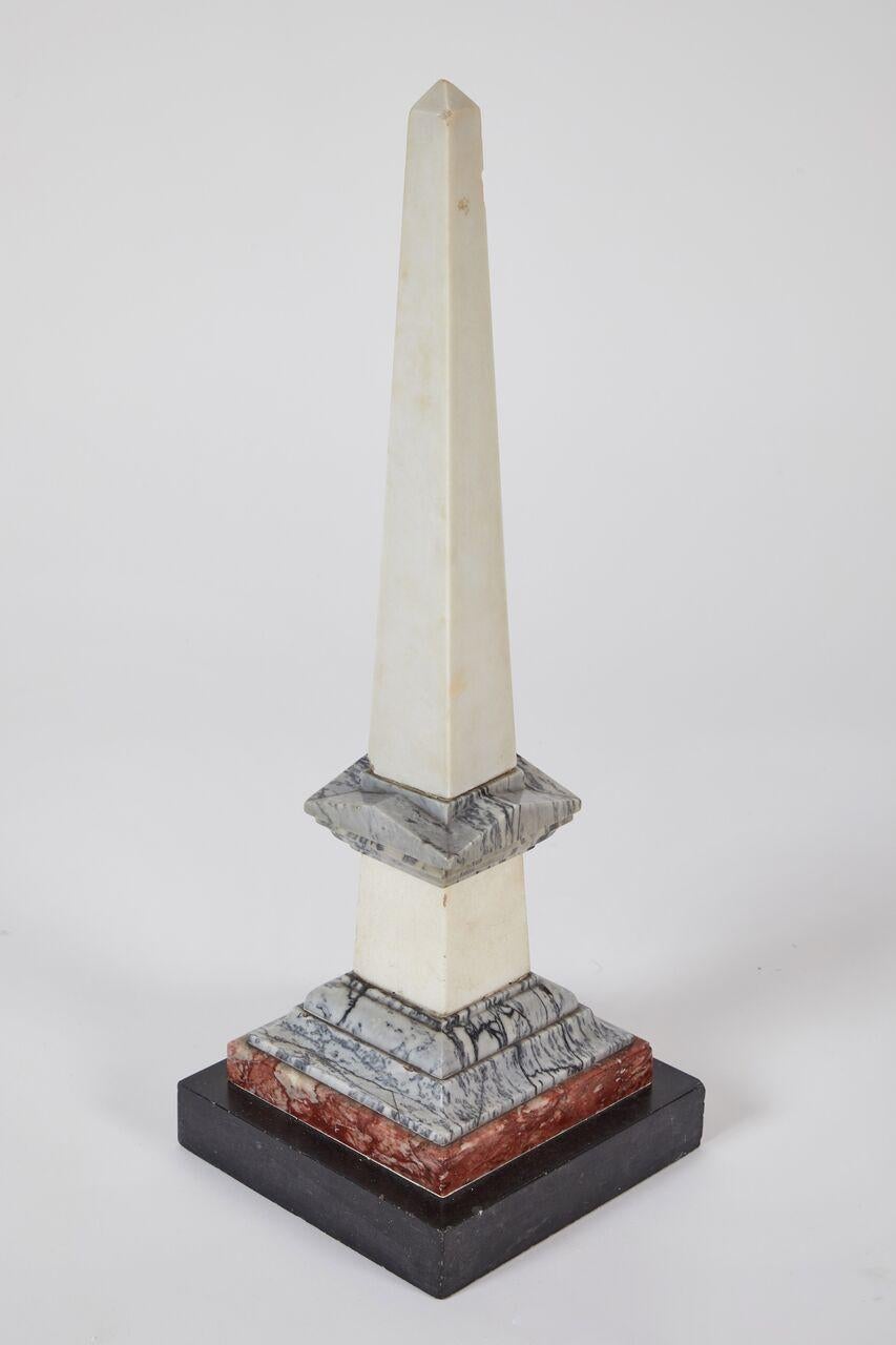 This very decorative 19th century obelisk. Tapering body raised on four square stepped socle base. Wonderful condition throughout and original patina. Sturdy centrepiece, its simply elegant line will fits perfectly with any kind of furnishing and in