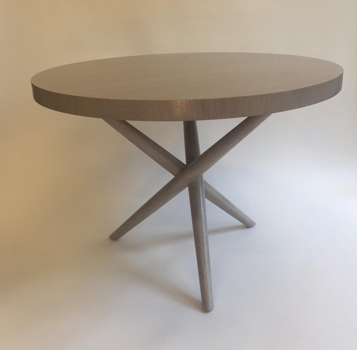 Newly restored white oak round Robsjohn Gibbings Gray side tables  
