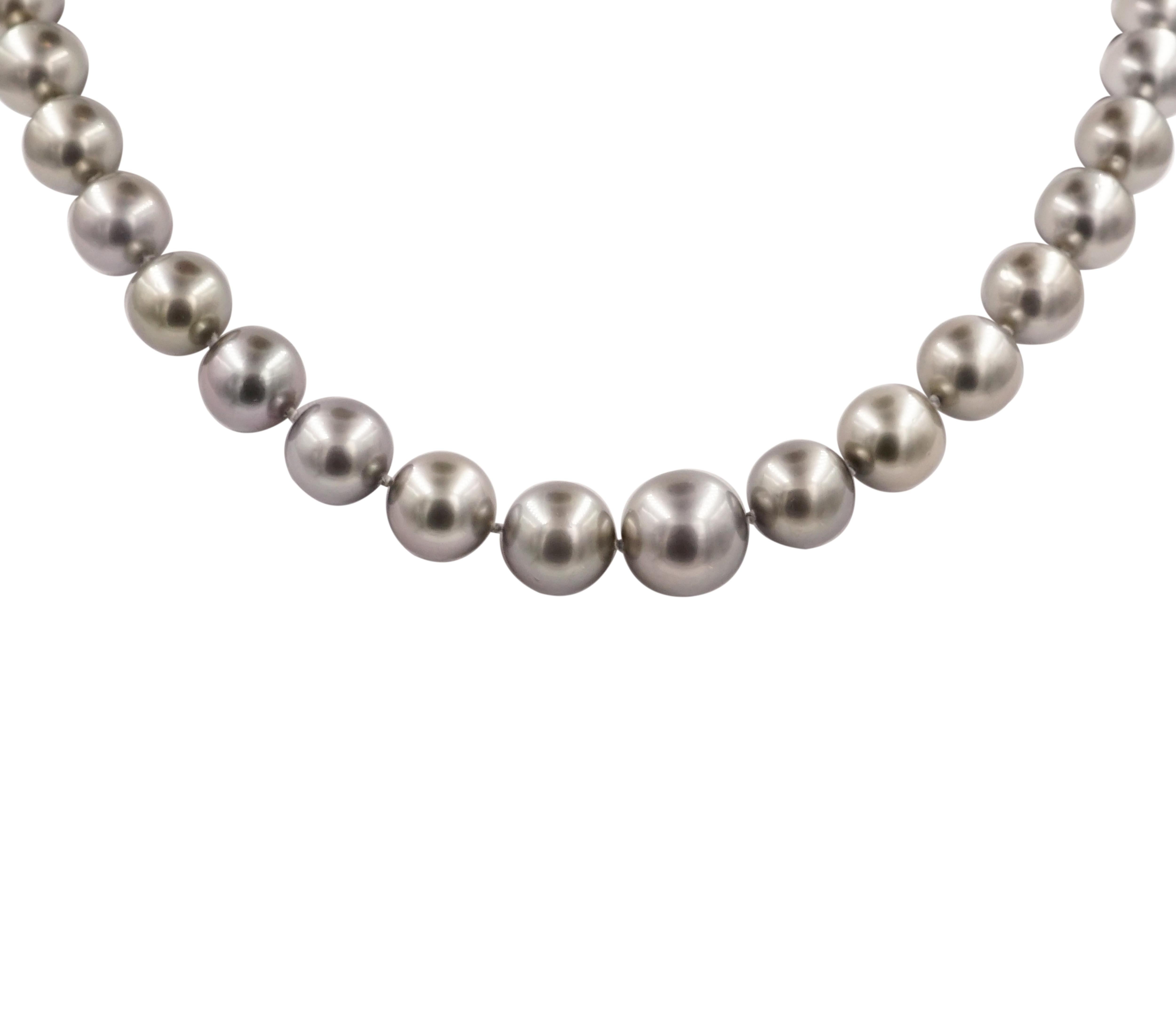 This elegantly feminine and slightly graduated south sea pearl necklace is certain to become a timeless heirloom. 
The handmade 18