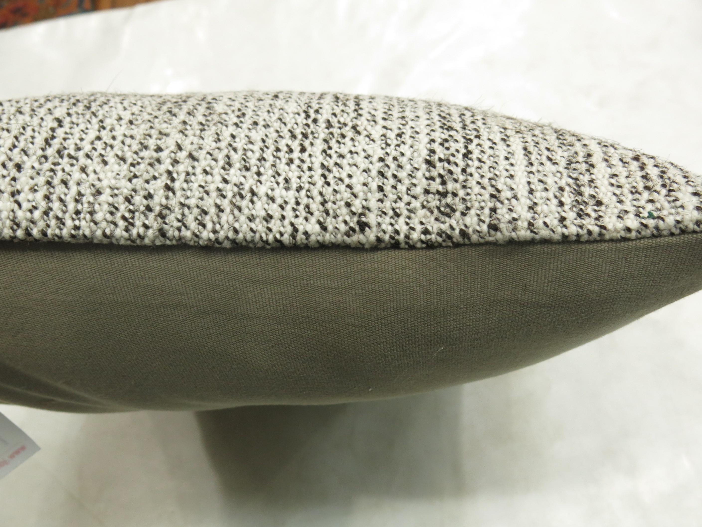 Gray color speckled pillow made from a vintage Turkish Kilim.

17'' x 18''