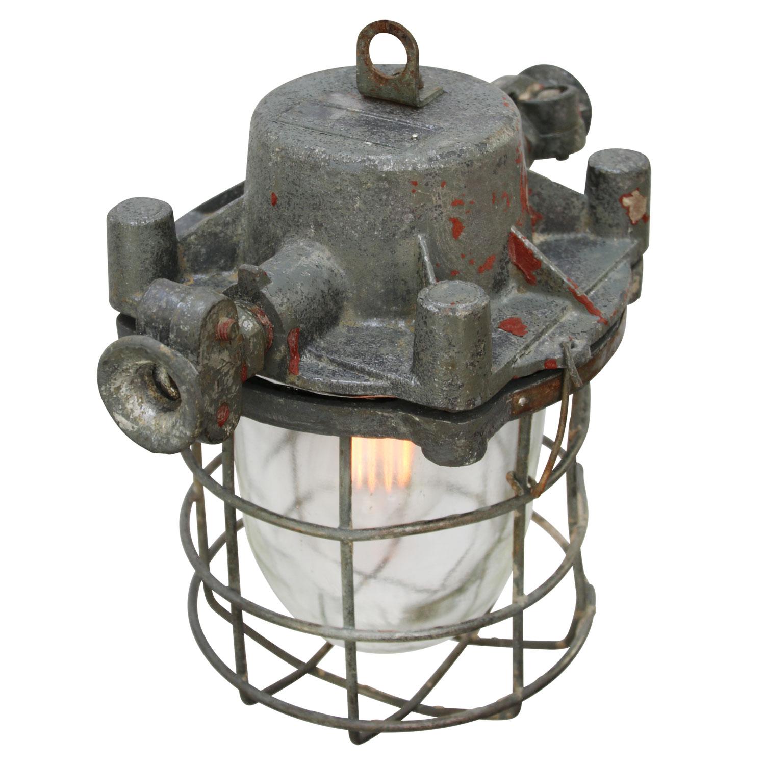 Vintage European industrial hanging lamp.
Cast aluminum with clear glass. 

Weight 5.4 kg / 11.9 lb

Priced per individual item. All lamps have been made suitable by international standards for incandescent light bulbs, energy-efficient and LED