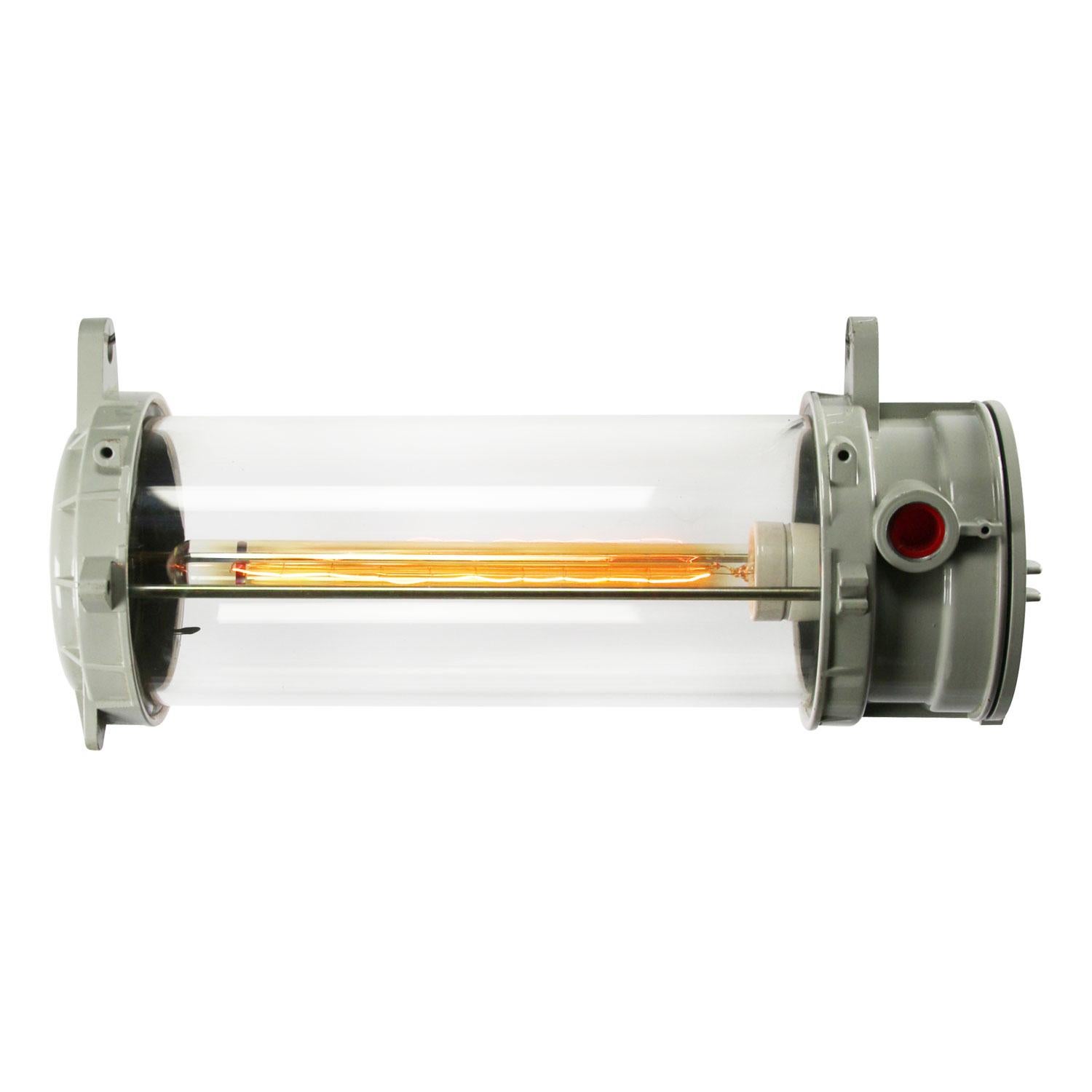 Tube industrial cast aluminum light. 
Clear glass. Converted for E26 / E27 light bulbs.

Weight: 5.0 kg / 11 lb

Priced per individual item. All lamps have been made suitable by international standards for incandescent light bulbs,