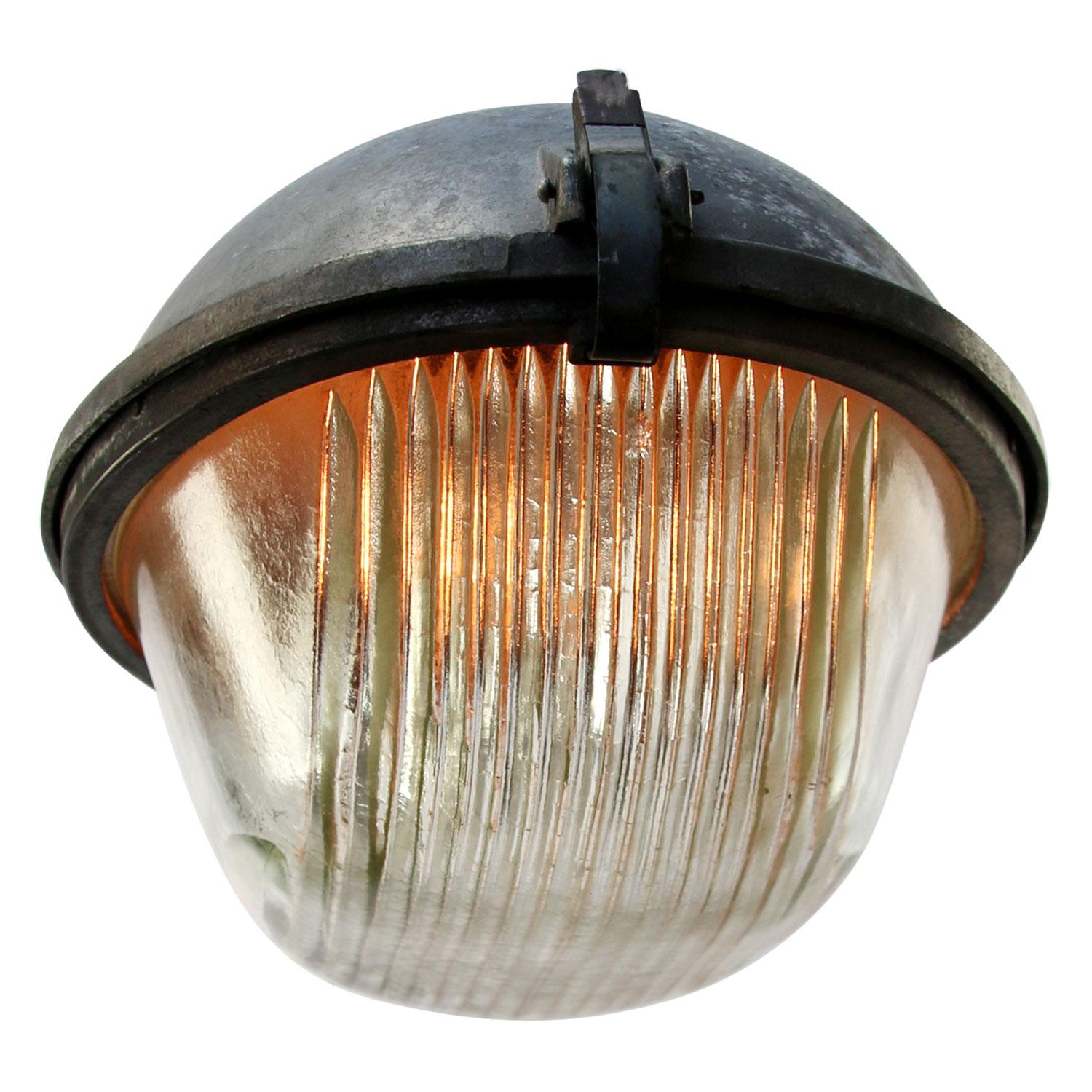 Large street wall light.
Aluminum body with round Holophane glass.

Weight 7.00 kg / 15.4 lb

Priced per individual item. All lamps have been made suitable by international standards for incandescent light bulbs, energy-efficient and LED bulbs.