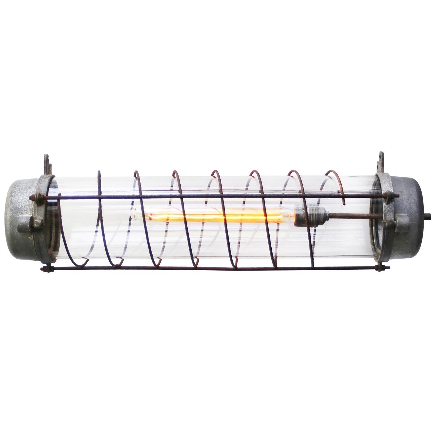 Industrial cast aluminum light. Clear glass. 

Weight 3.0 kg / 6.6 lb

Priced per individual item. All lamps have been made suitable by international standards for incandescent light bulbs, energy-efficient and LED bulbs. E26/E27 bulb holders and