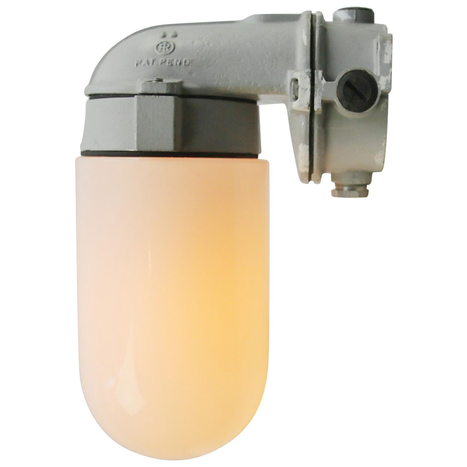 Industria Rotterdam Industrial wall light
cast aluminium, opaline glass

Size wall box : 13 × 9 cm

Weight: 1.50 kg / 3.3 lb

Priced per individual item. All lamps have been made suitable by international standards for incandescent light