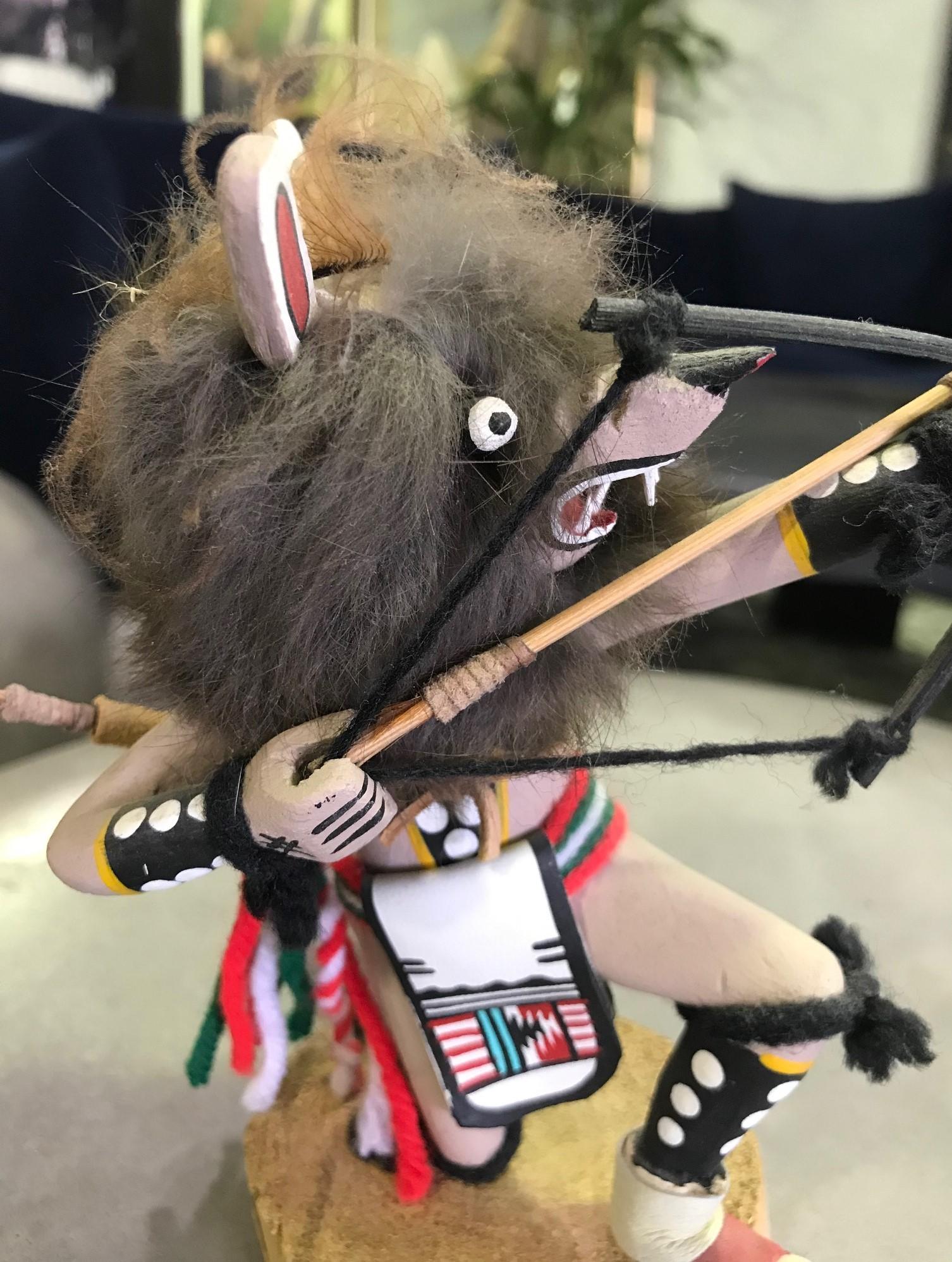 A wonderfully detailed and decorated wolf figure Kachina doll with fur.

Signed by the artist on the base.

From a collection of Native American objects and artifacts.

Dimensions: 6