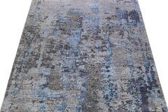 Tapis moderne en laine et soie gris fait à la main avec motif abstrait
