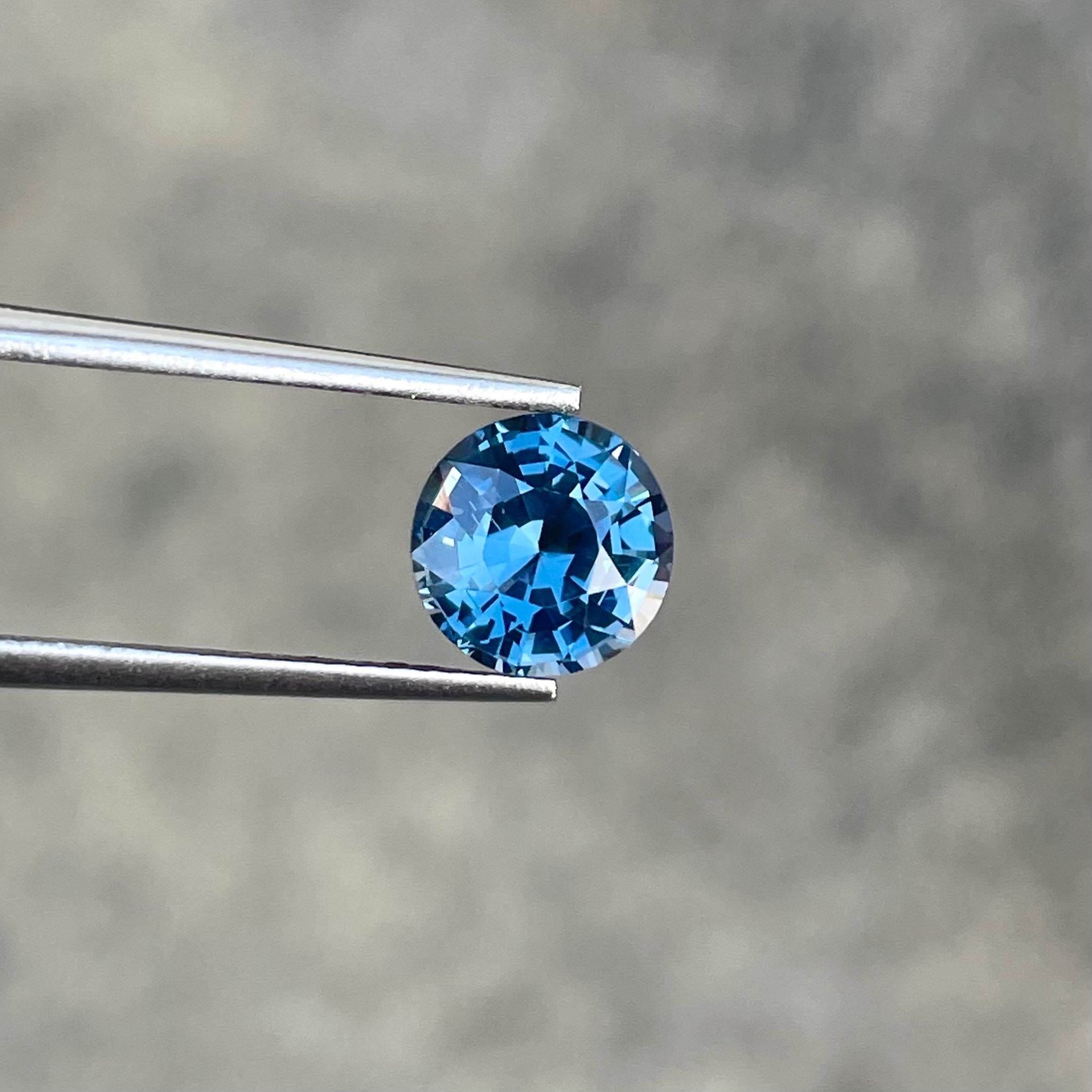Weight 2.10 carats 
Dimensions 7.6x7.5x5.13 mm
Treatment none 
Origin Sri Lanka 
Clarity VVS
Shape round 
Cut round brilliant 




The Grayish Blue Spinel is a captivating gemstone, boasting a substantial weight of 2.10 carats and a beautifully