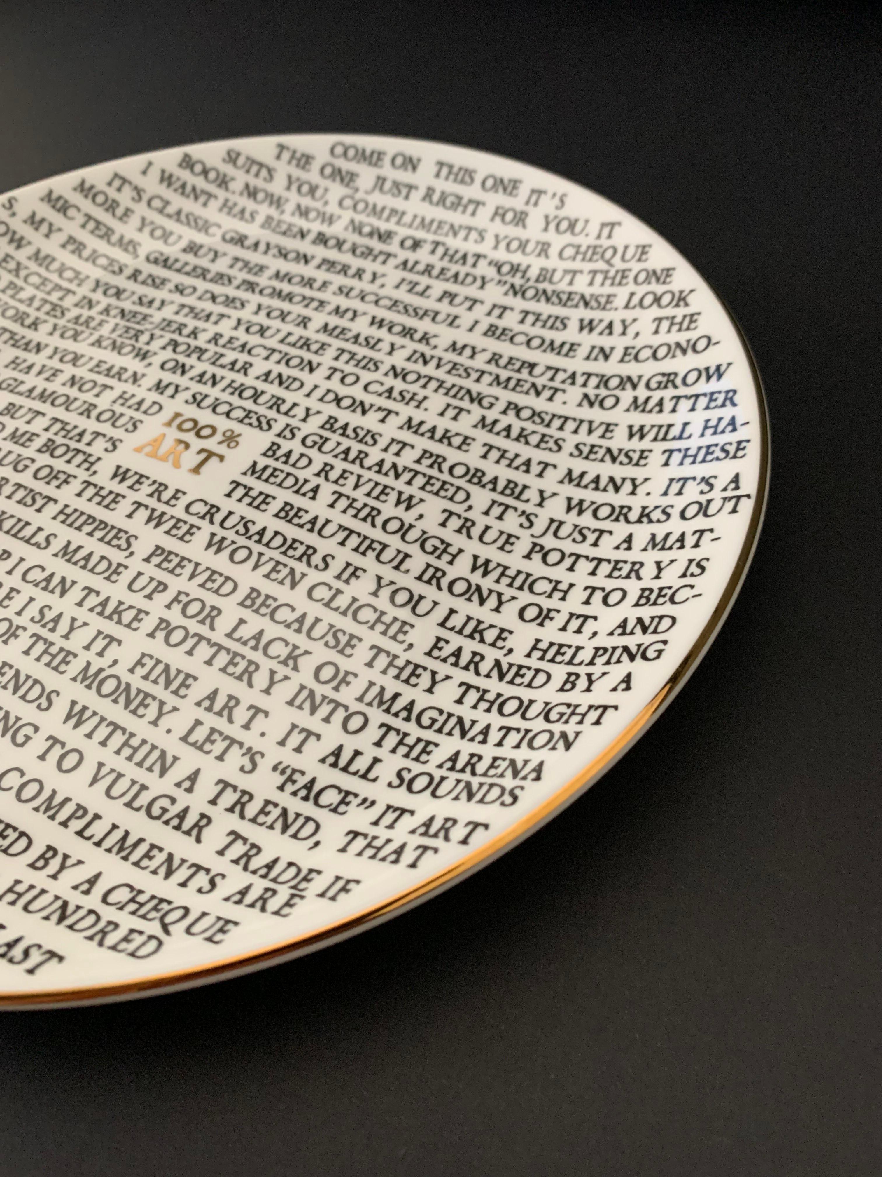 Grayson Perry 
''100% Art'' 
Ceramic Plate.
On the reverse is the classic Grayson Perry Stamp, depicting the Crown, Anchor and 'W'
The Plate measures 21cm in diameter. 