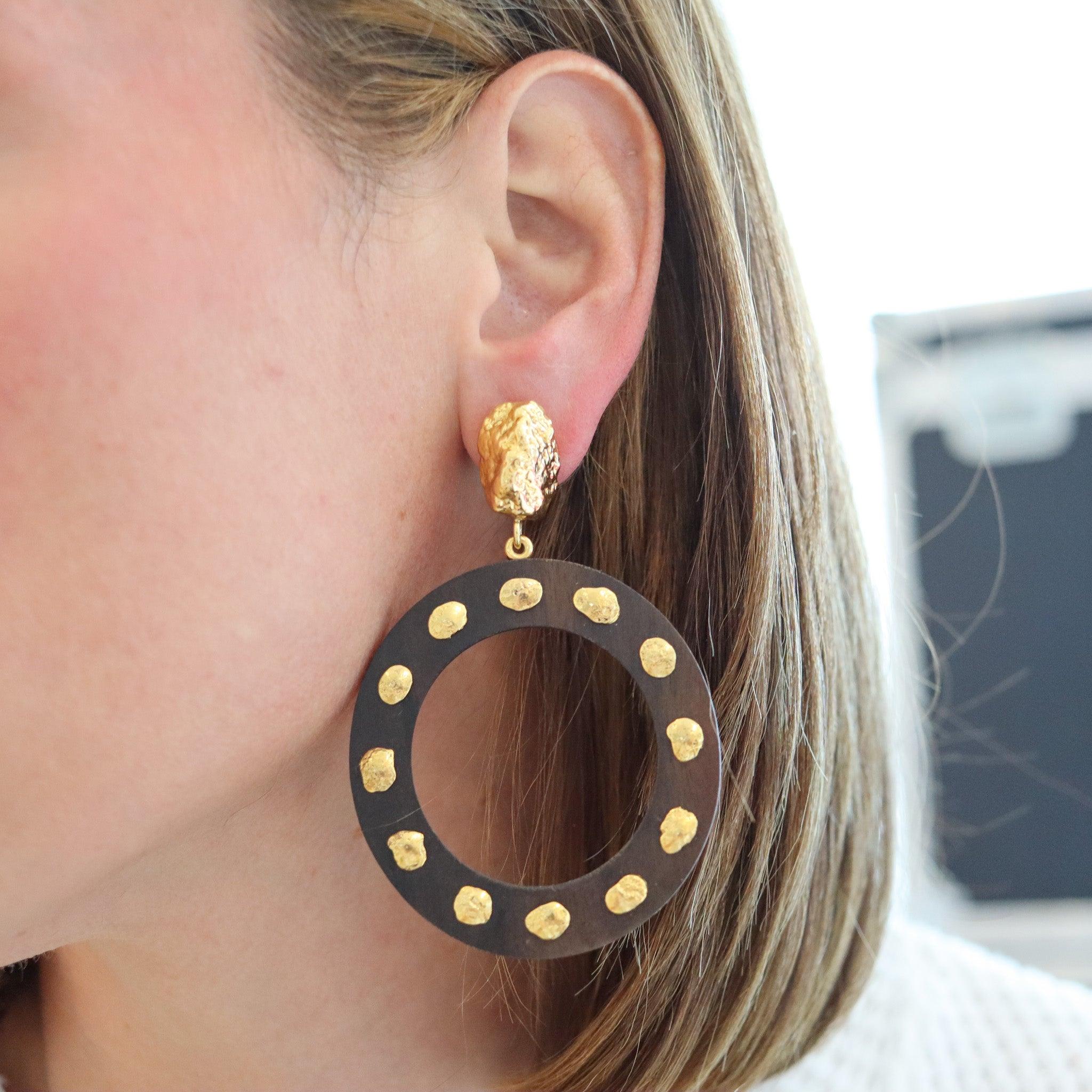 Pair of dangle earrings designed by Grazia And Marica Vozza

This is a fabulous pair of modernist dangle earrings, created in Capri Italy by the twin sister jewelry designers Grazia and Marica Vozza. These earrings are an statement and have been