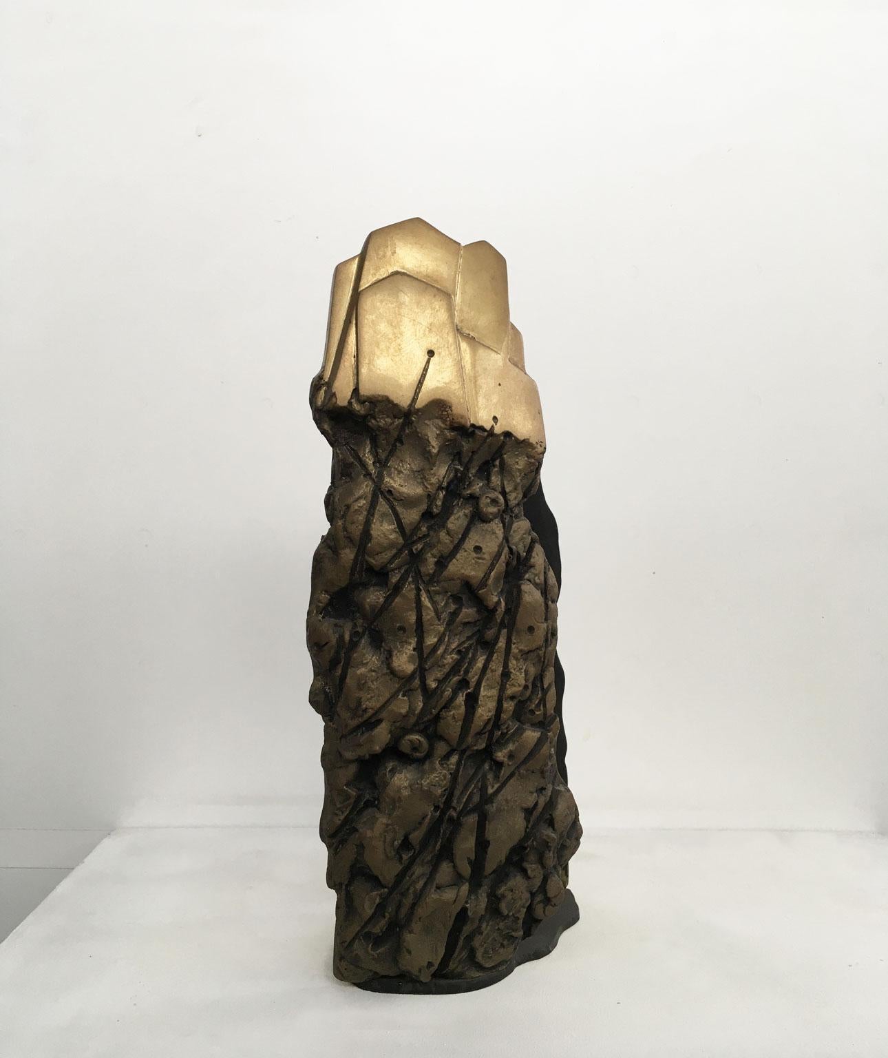 This very interesting abstract bronze sculpture, it is one of a kind artwork, created in 1979 by the Italian artist Graziano Pompili, 
The title "Paesaggio con ombra", is translated in "Landscape with shadow"
This bronze sculpture can be useful as