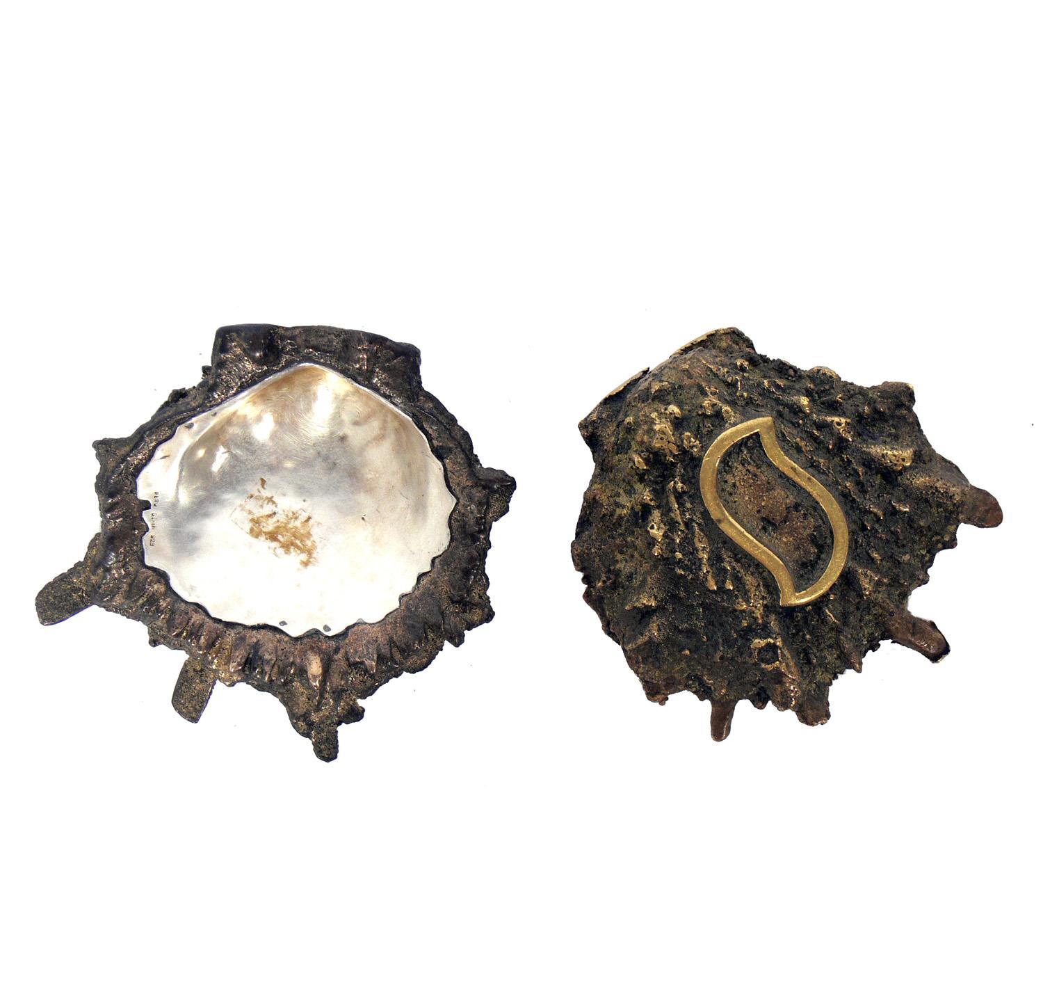 Graziella Laffi bronze shell form bowls, Peru, circa 1950s. They are constructed of bronze and silver plated brass. They are a petite size, perfect as a home for your rings, coins, paper clips, or detritus of the day. They retain their warm original