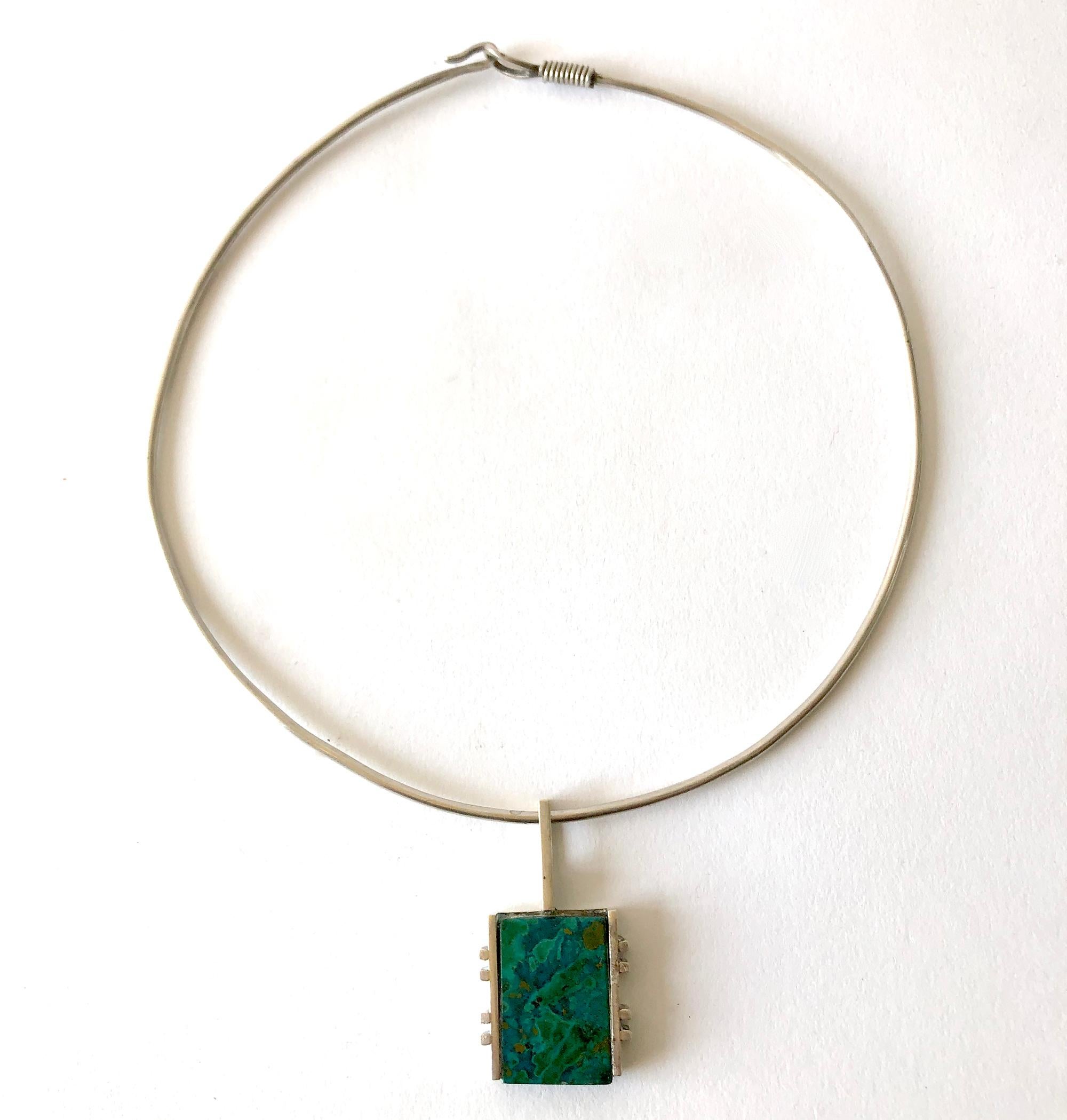 Sterling silver and malachite pendant necklace created by Graziella Laffi of Peru. Necklace choker measures 18
