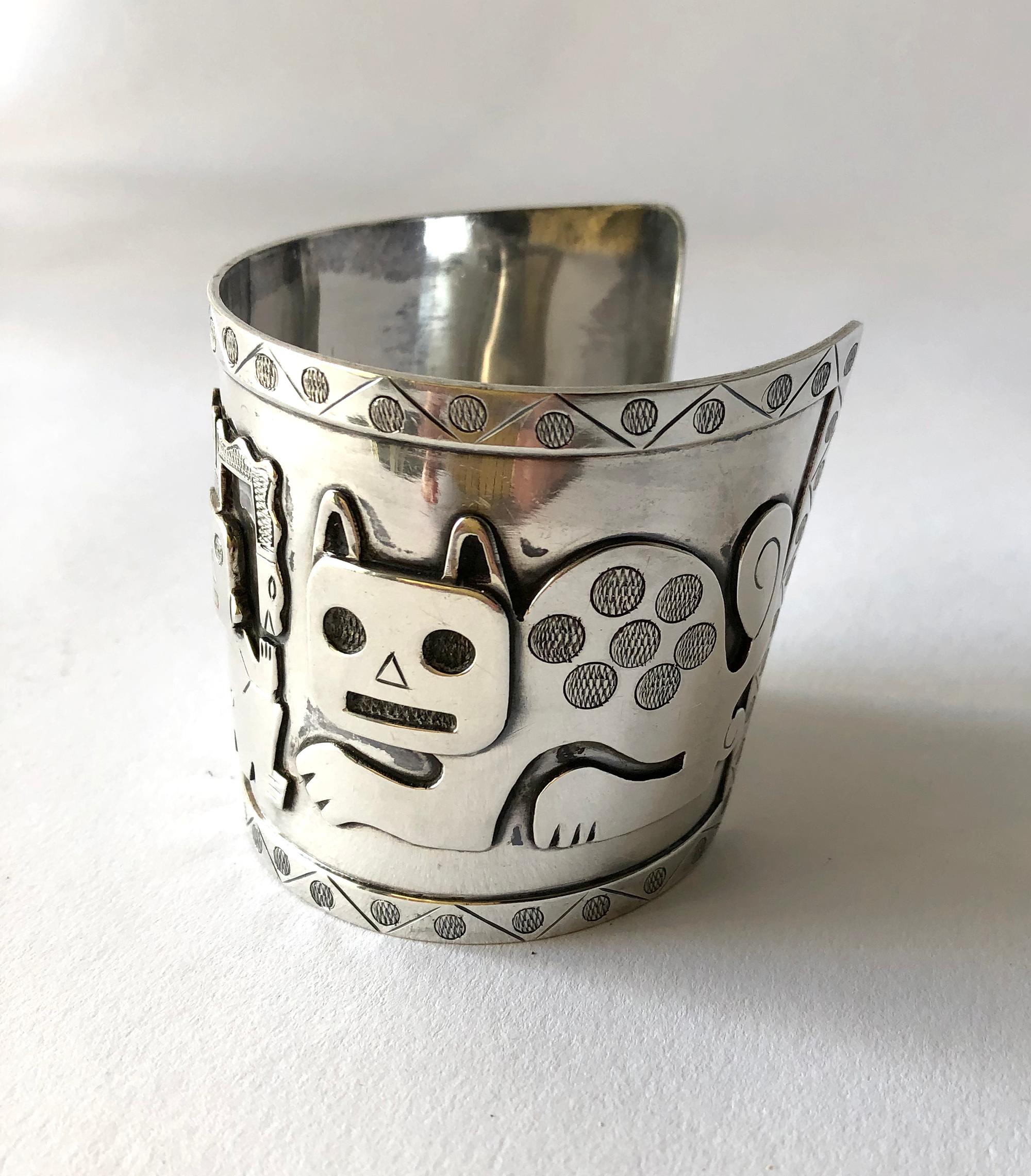 Sterling silver Peruvian cuff bracelet with Aztec cat design.  Cuff is 2 3/8