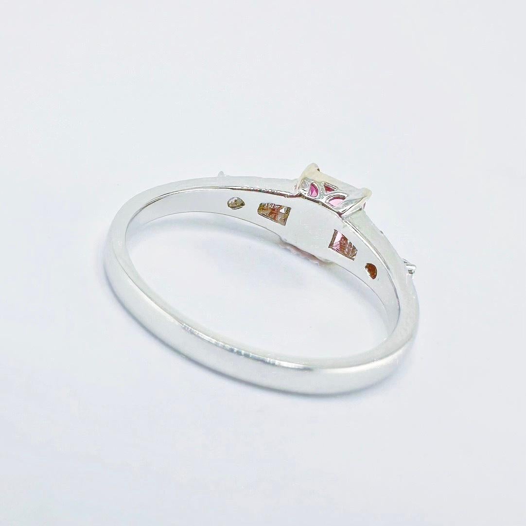Modern GRC Certified 0.74 CT Padparadscha Sapphire 18K White Gold Ring with Diamonds For Sale