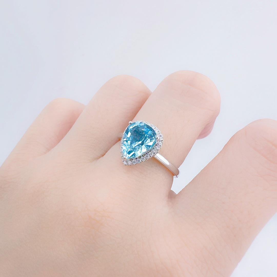 Pear Cut GRC Certified 2.16 CT Intense Blue Aquamarine Ring with Diamonds For Sale