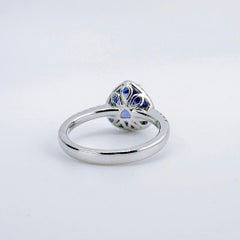 GRC Certified Cornflower Blue Tanzanite 18K Gold Ring with Diamonds