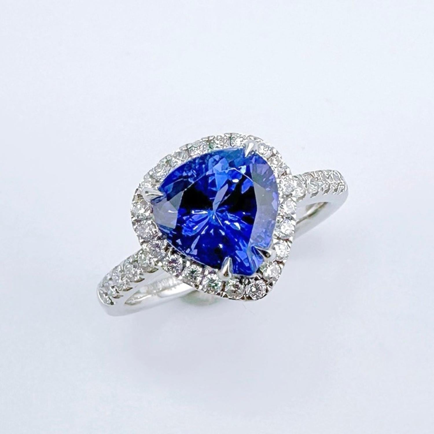 Pear Cut GRC Certified Cornflower Blue Tanzanite 18K Gold Ring with Diamonds For Sale