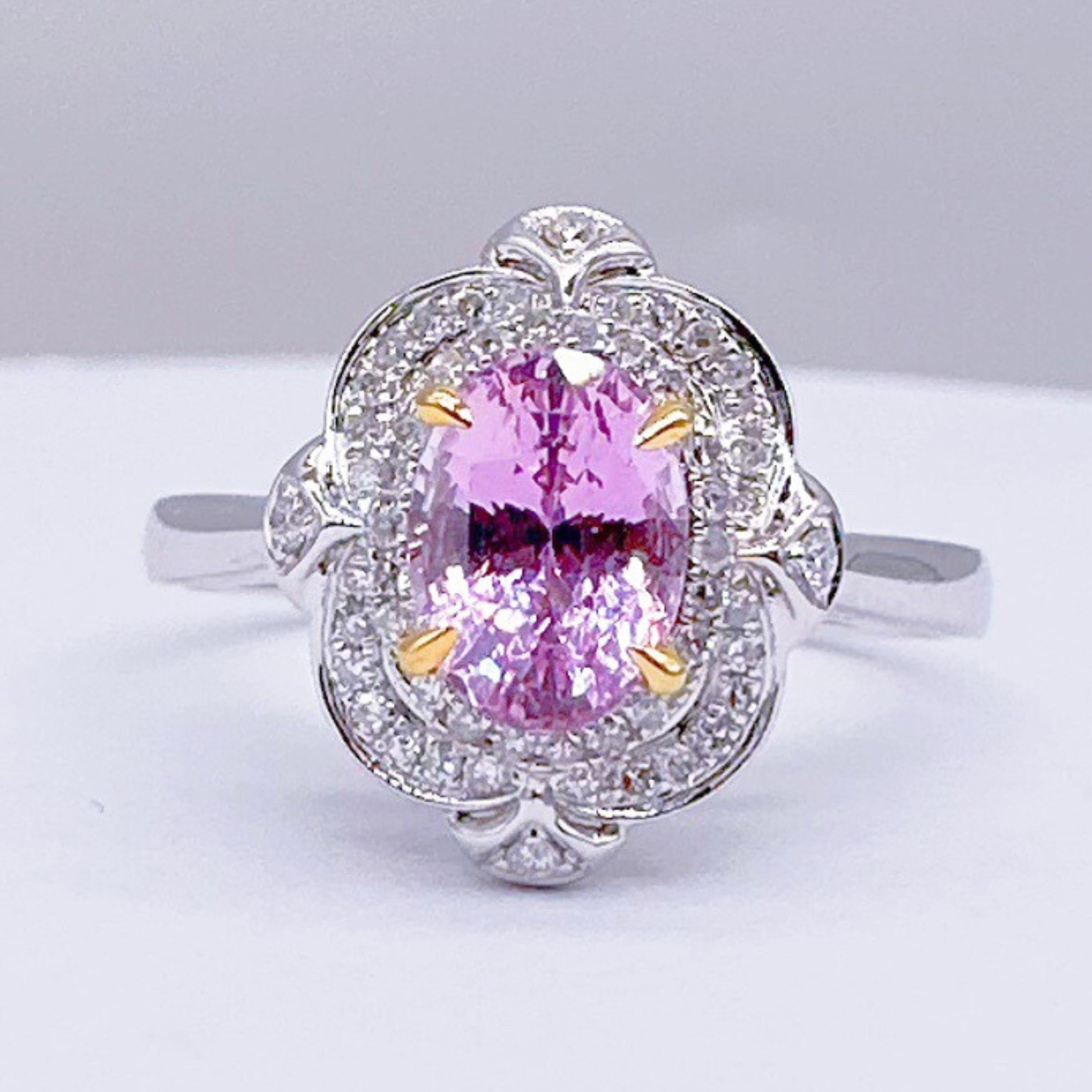 GRC Certified Padparadscha Sapphire 18K White Gold Cocktail Ring with Diamonds

1 Sapphire - 1.11 CT
Diamonds - 0.178 CT
18K Gold - 2.95 GM

Sapphire -  Lotus Color
GRC Certified
