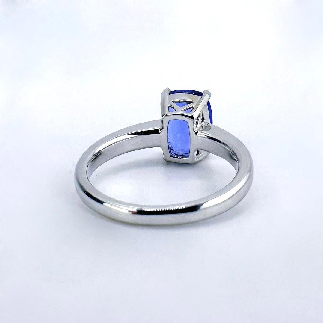 Modern GRC Certified Vivid Blue 2.38 CT Tanzanite 18K White Gold Ring with Diamonds For Sale